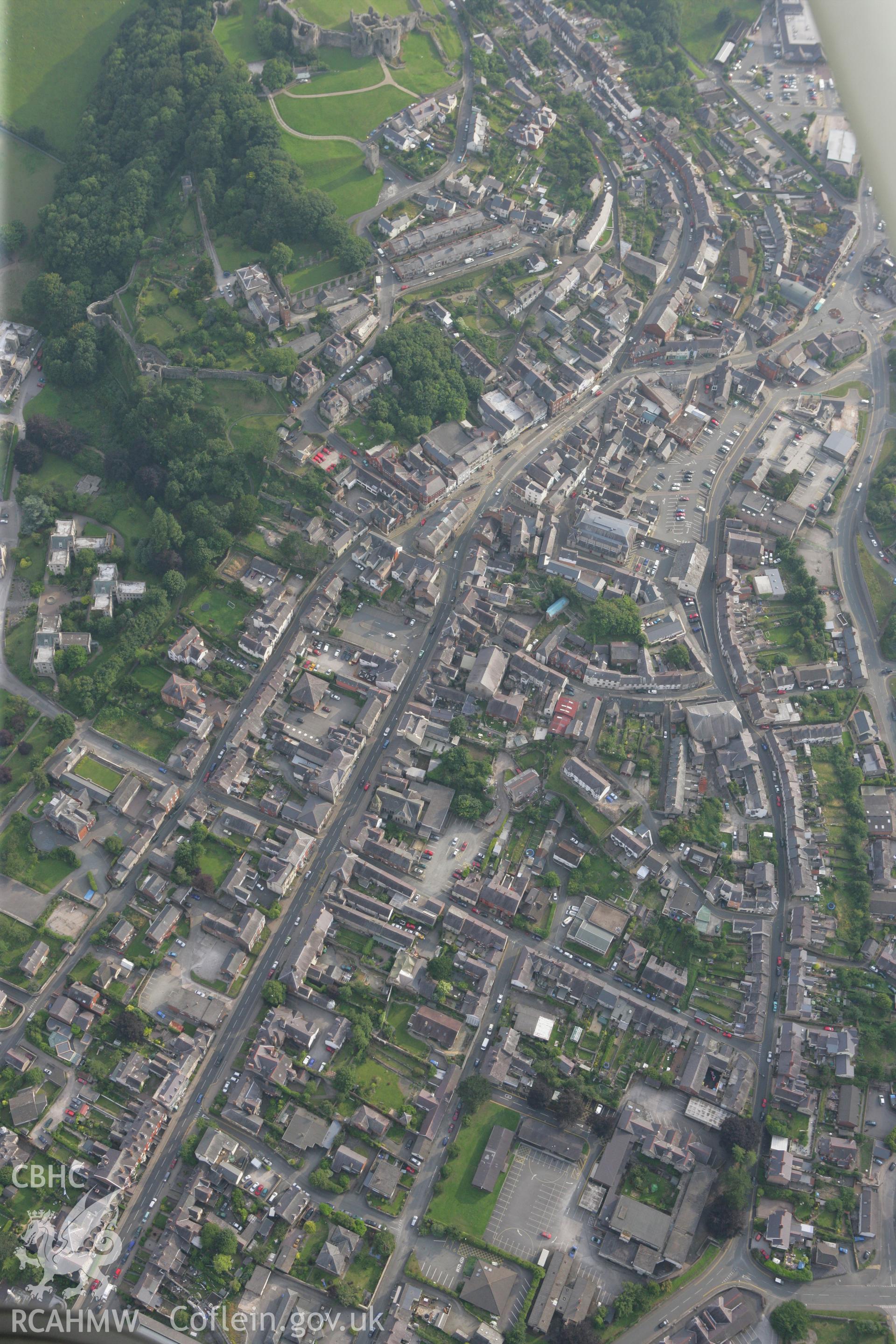 RCAHMW colour oblique photograph of Denbigh, with Town Walls and Castle. Taken by Toby Driver on 24/07/2008.