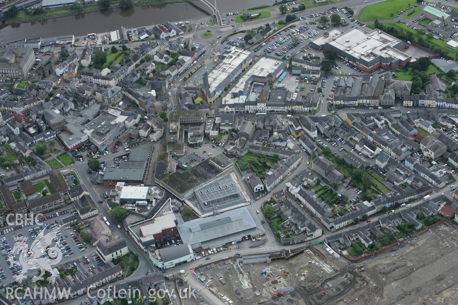 RCAHMW colour oblique photograph of Carmarthen Old Provision Market, with development works for the St Catherine Shopping Centre. Taken by Toby Driver on 12/09/2008.