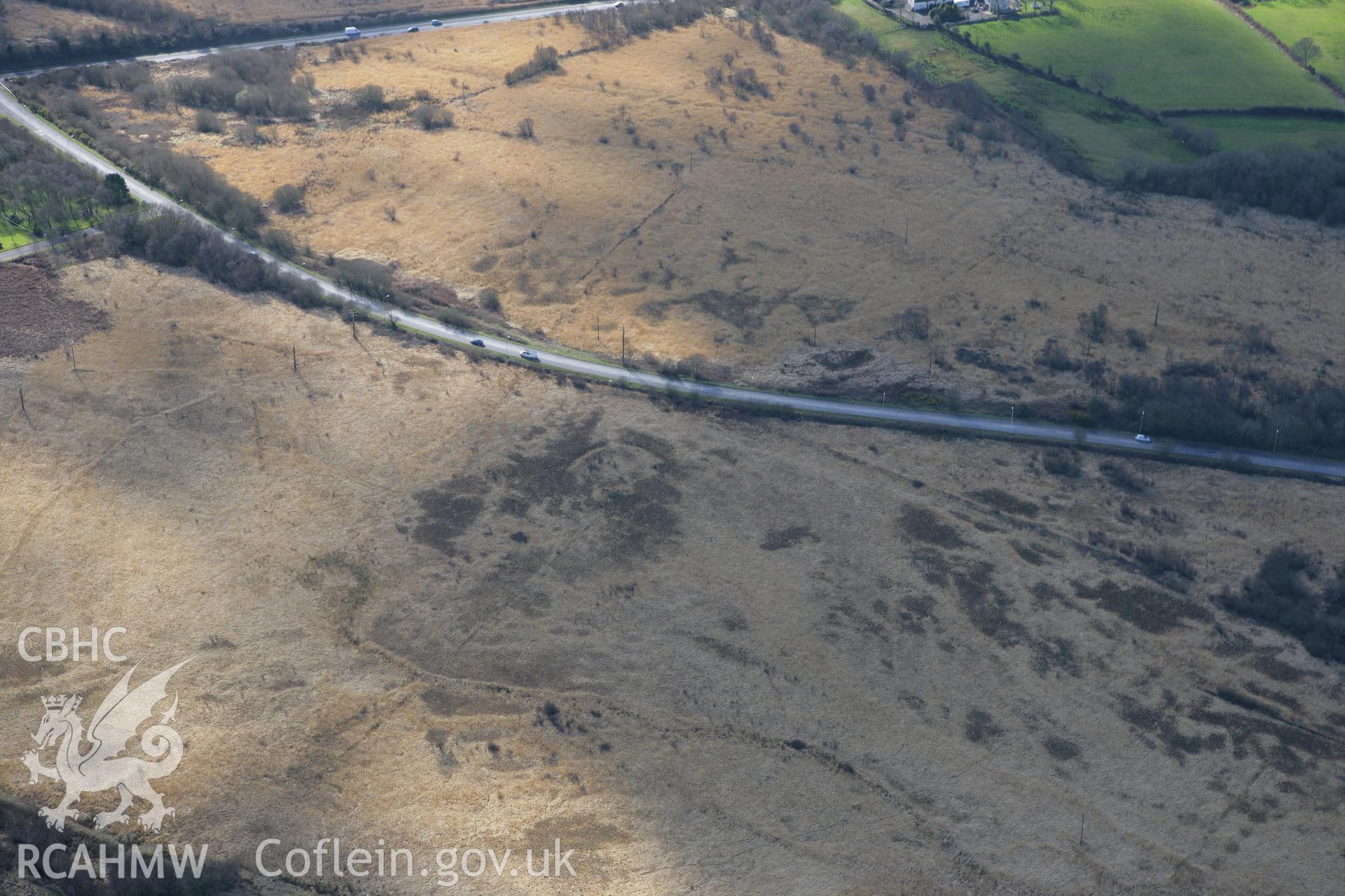 RCAHMW colour oblique photograph of Mynydd Carn Goch, enclosure earthworks and earthworks of Carn Goch Isolation Hospital. Taken by Toby Driver on 04/03/2008.