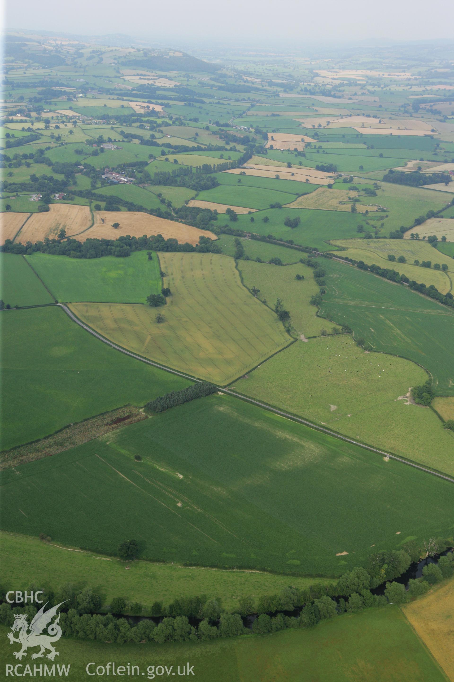 RCAHMW colour oblique photograph of Forden Gaer Roman Fort. Taken by Toby Driver on 24/07/2008.