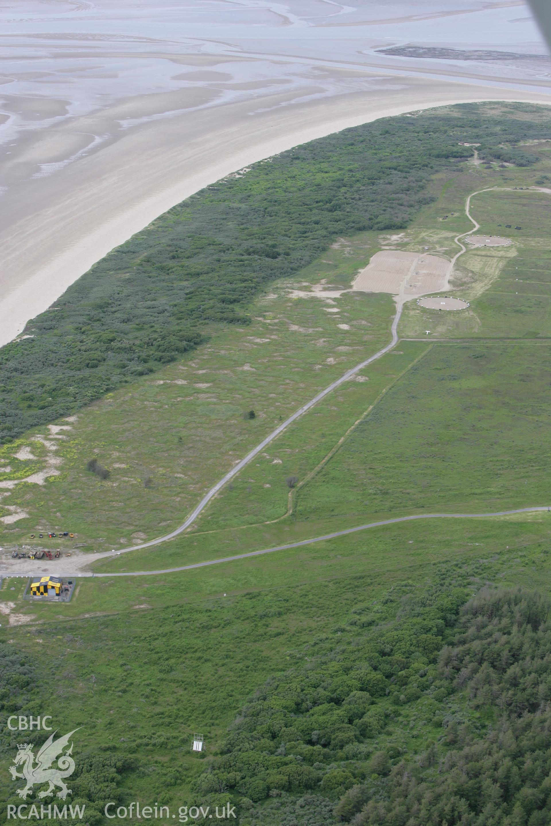 RCAHMW colour oblique photograph of Pembrey Sands, Air Weapons Range. Taken by Toby Driver on 20/06/2008.