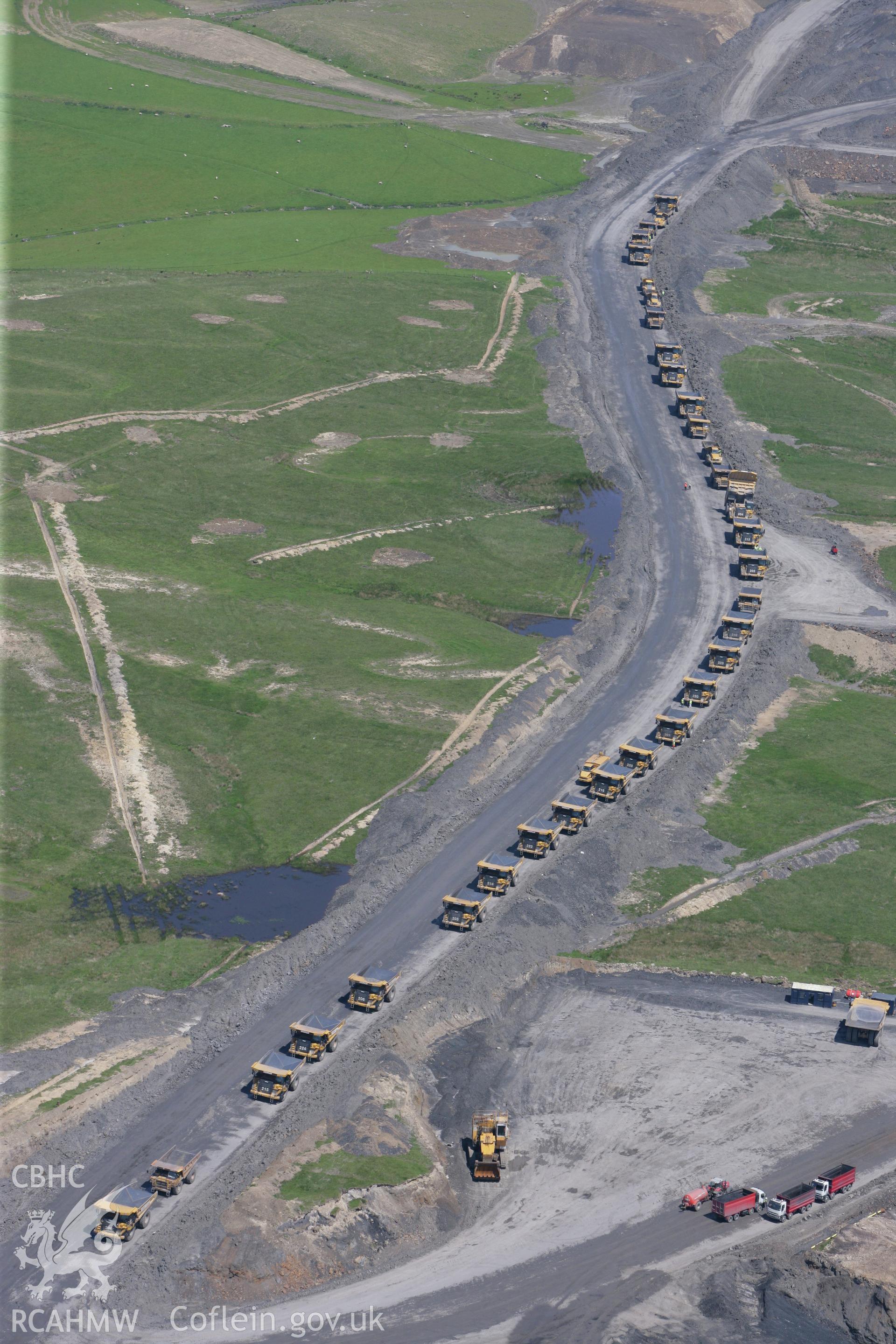RCAHMW colour oblique photograph of lorries at Ffos-y-fran Dowlais Opencast workings. Taken by Toby Driver on 09/06/2008.