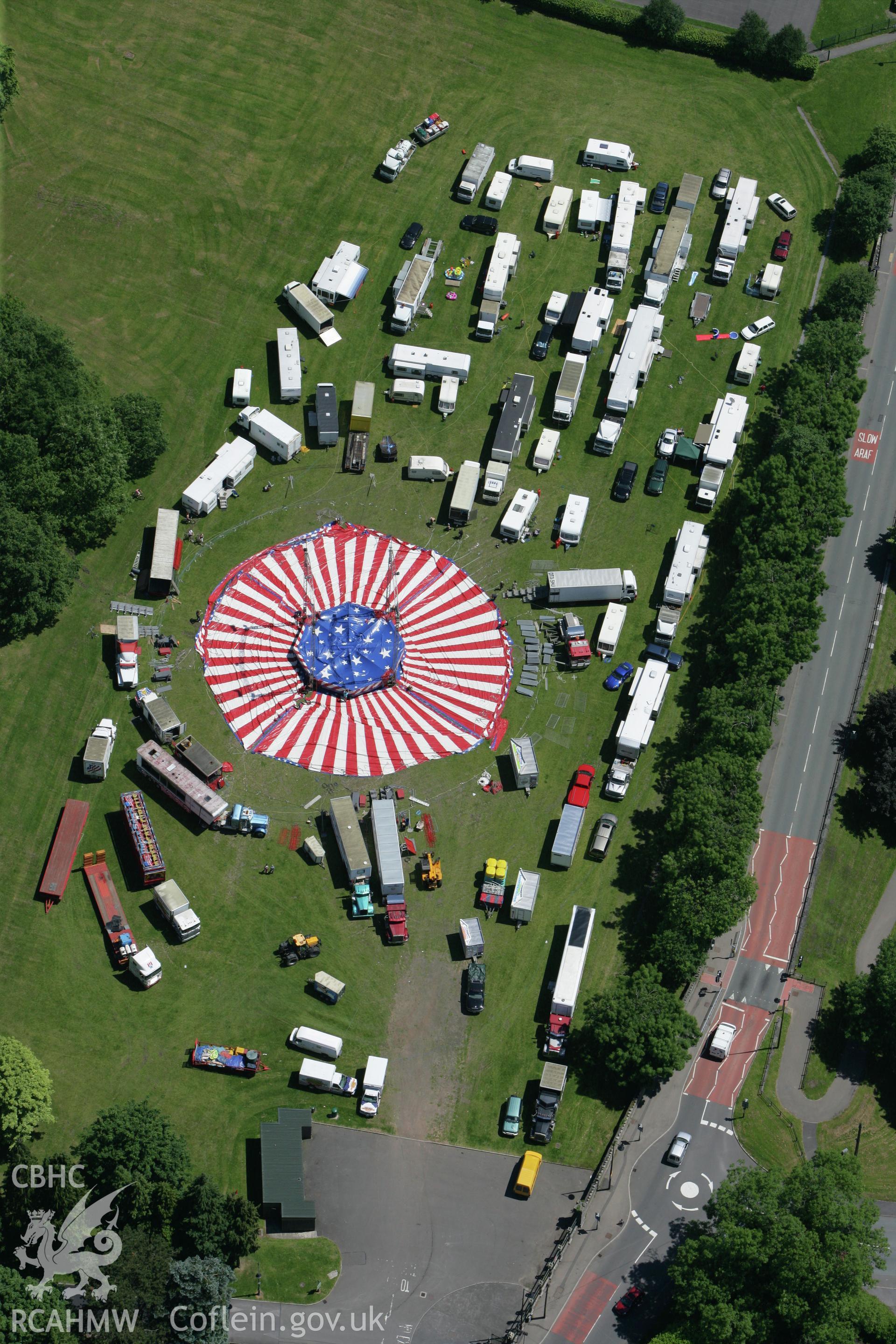 RCAHMW colour oblique photograph of American circus in the grounds of Cyfarthfa Castle. Taken by Toby Driver on 09/06/2008.