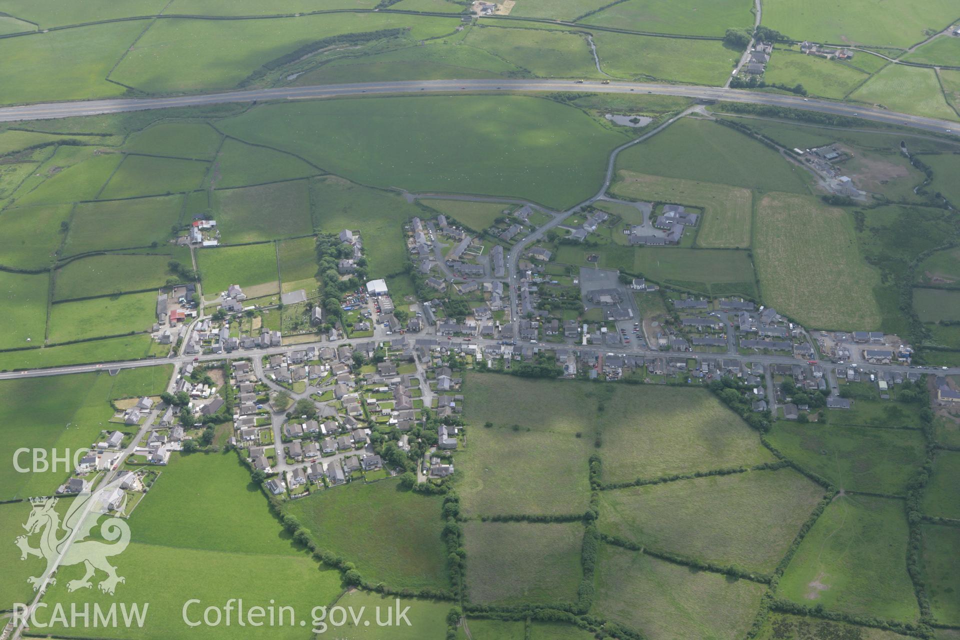 RCAHMW colour oblique photograph of Bryngwran village, from the north. Taken by Toby Driver on 13/06/2008.