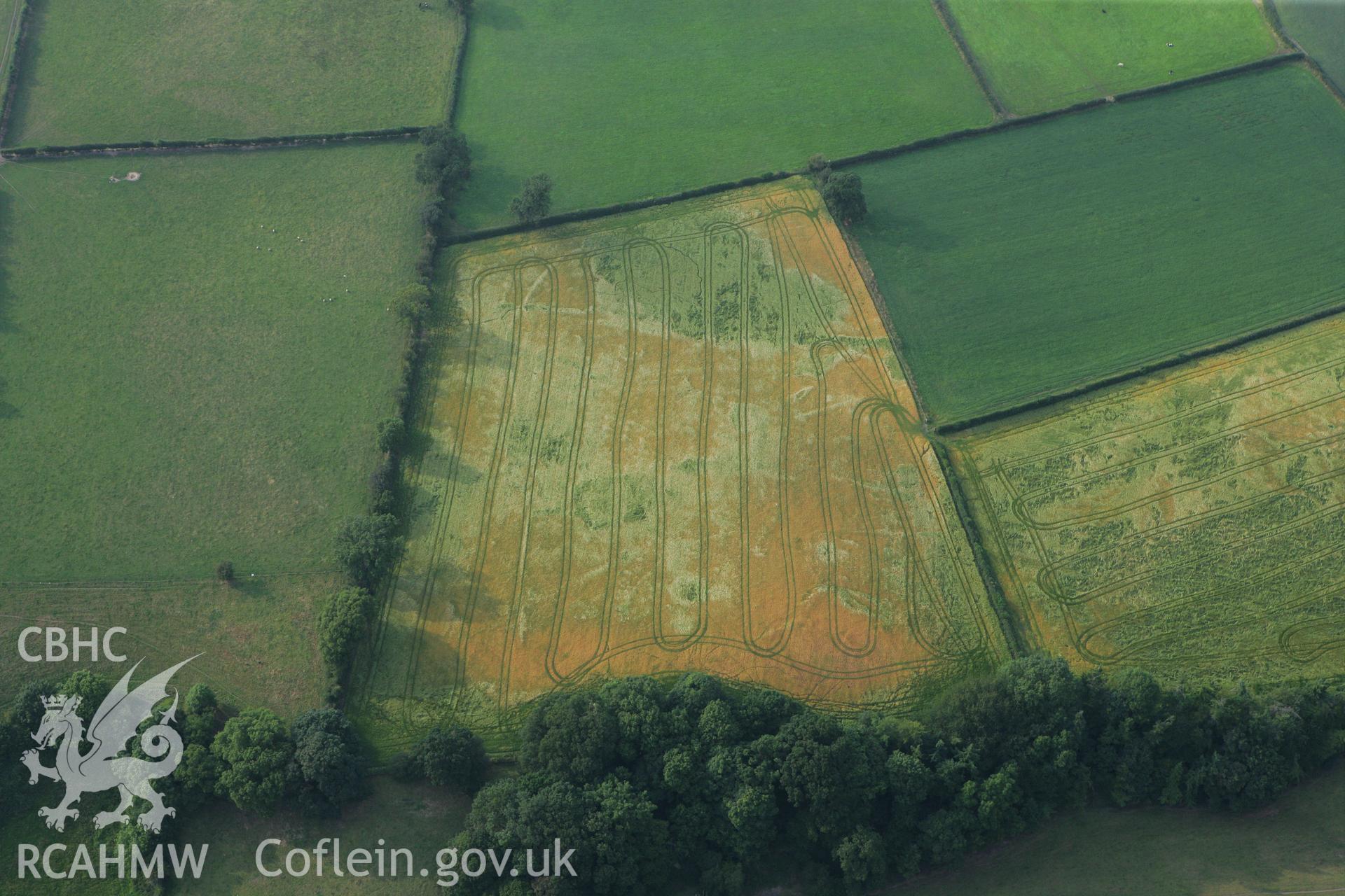 RCAHMW colour oblique photograph of Pennant Farm Cropmarks. Taken by Toby Driver on 24/07/2008.