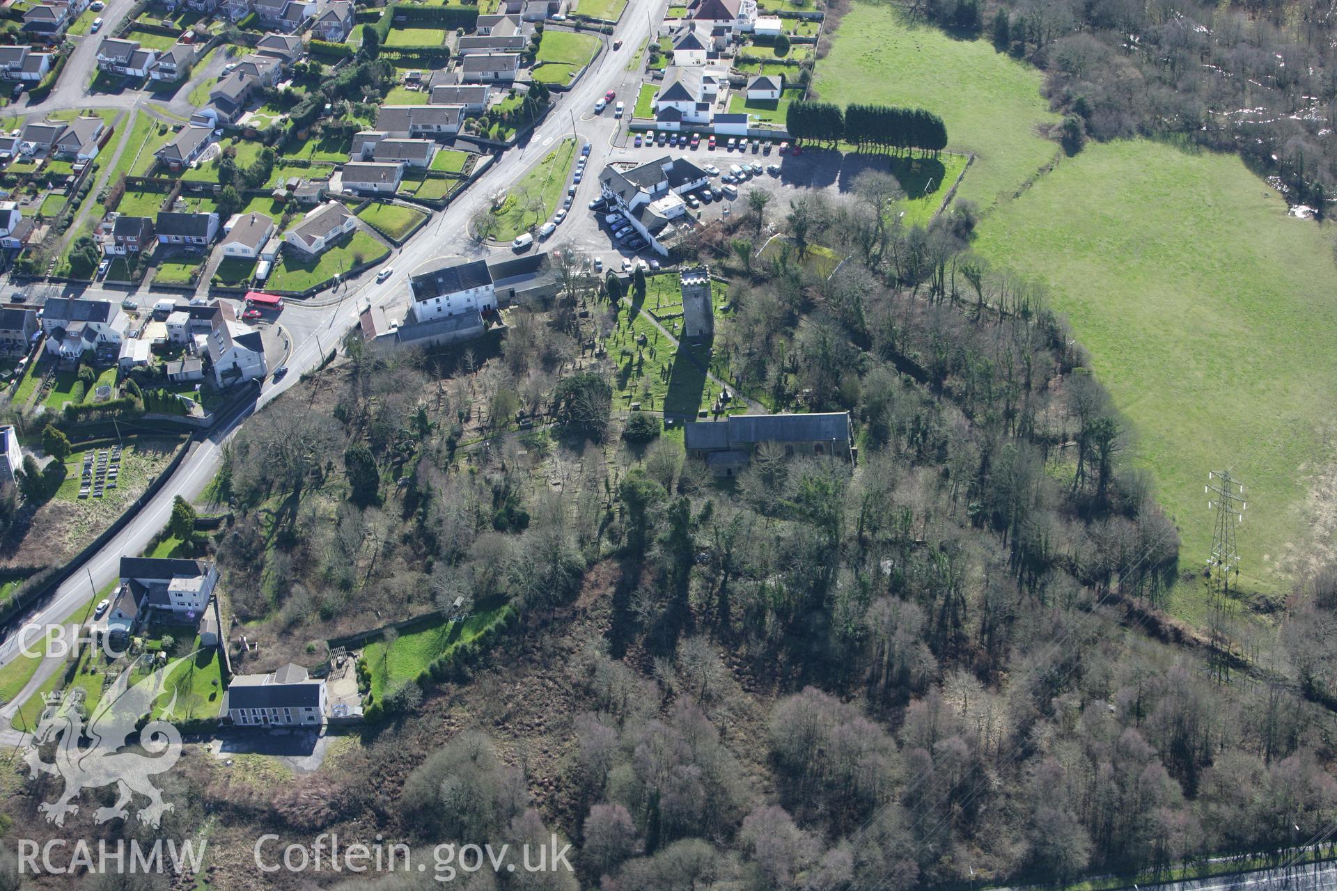 RCAHMW colour oblique photograph of St David and St Cyfelach's Church, Tower and Pillar Cross, Llangyfelach. Taken by Toby Driver on 04/03/2008.