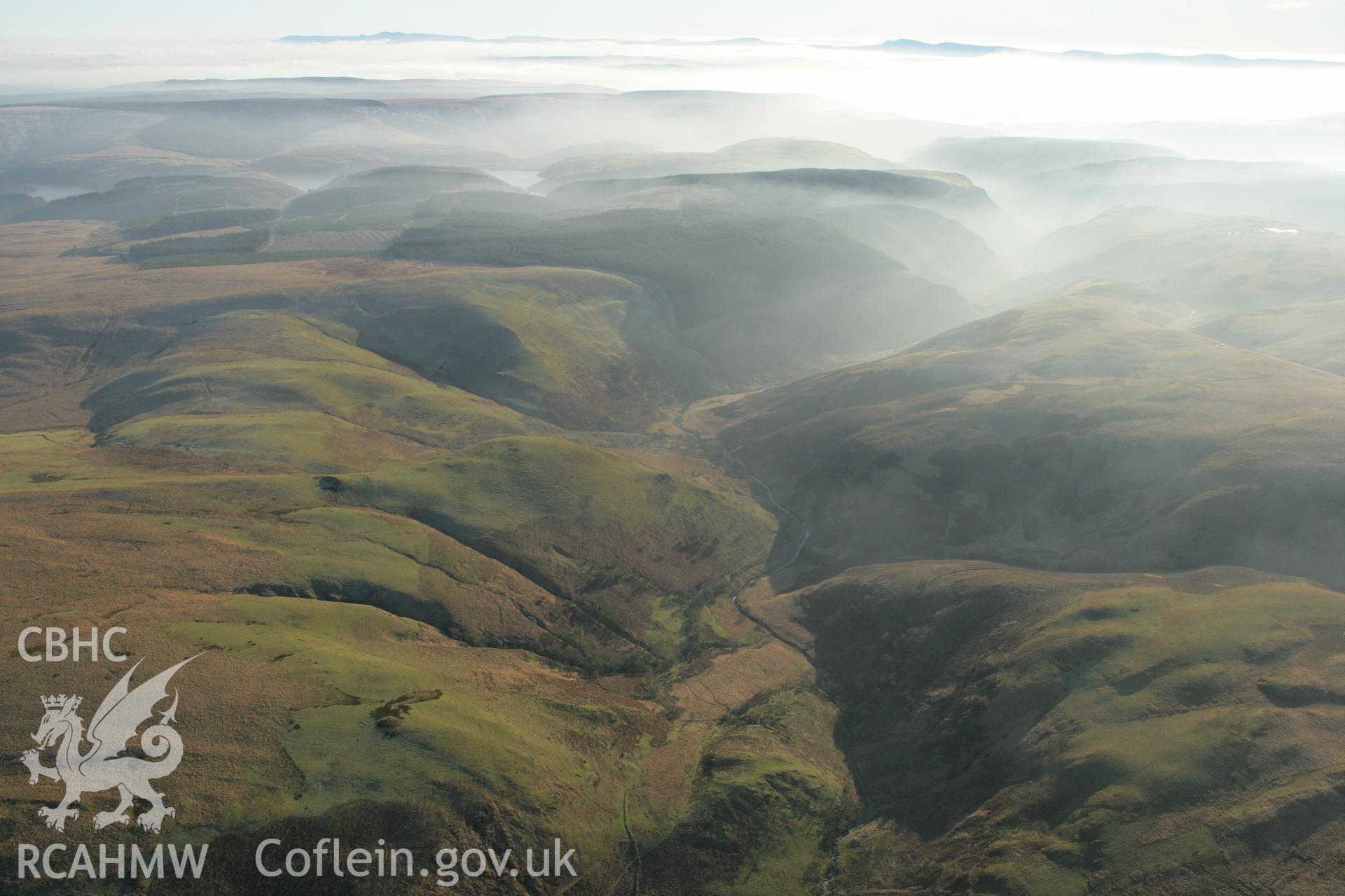 RCAHMW colour oblique photograph of Dinas Foelfraeth farmstead, showing winter landscape looking south. Taken by Toby Driver on 20/12/2007.