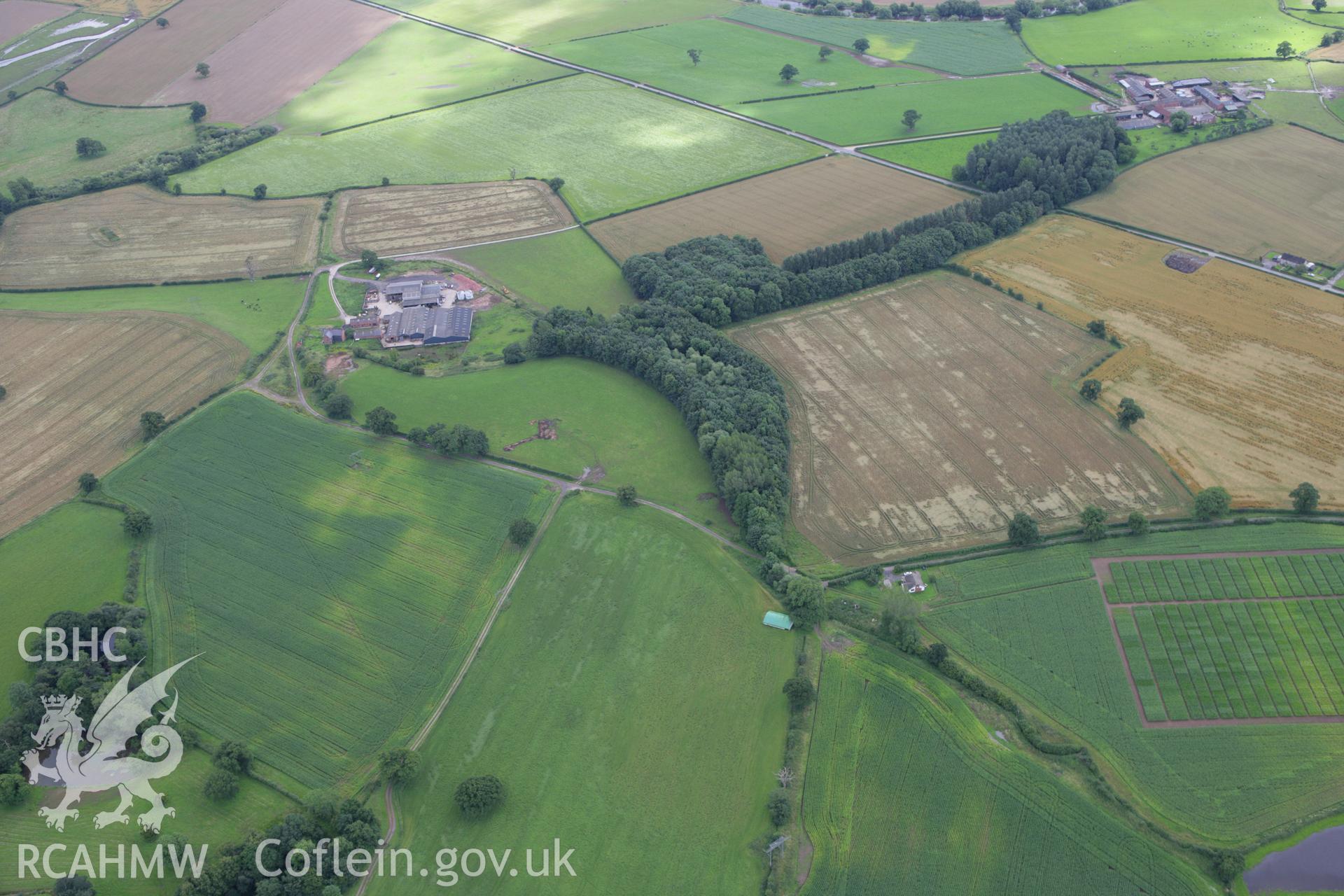 RCAHMW colour oblique aerial photograph showing view of Gerwyn-Fechan Cursus near Royton Wood. Taken on 24 July 2007 by Toby Driver