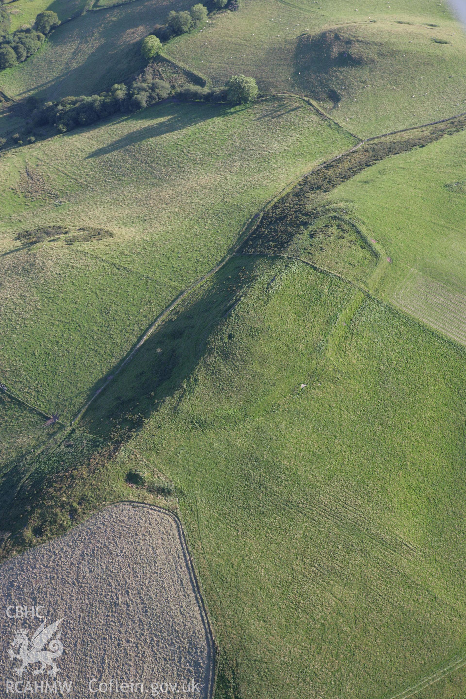 RCAHMW colour oblique aerial photograph of Gaer Fach Hillfort. Taken on 08 August 2007 by Toby Driver