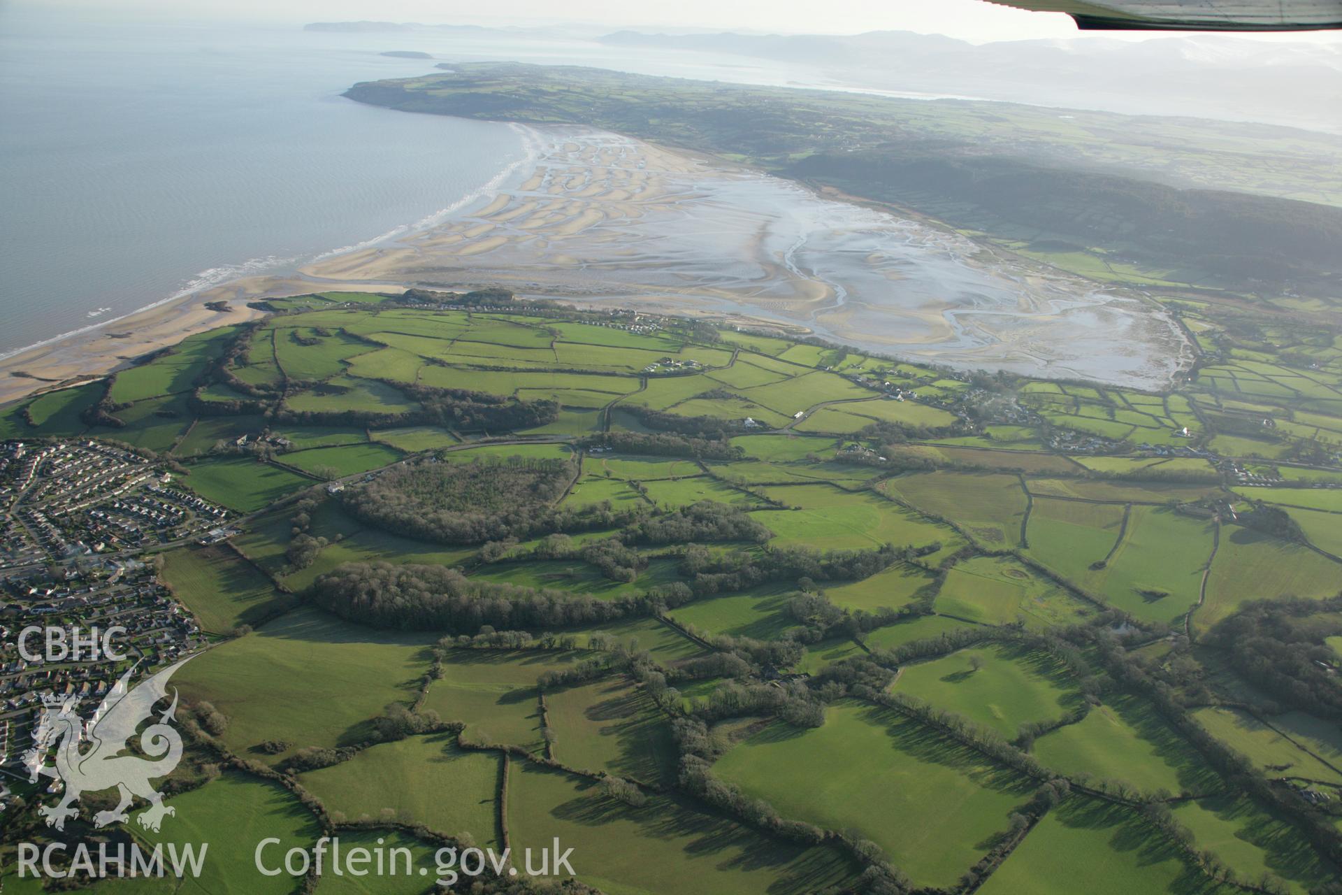 RCAHMW colour oblique aerial photograph of the Viking settlement at Glyn, Llanbedrgoch. Taken on 25 January 2007 by Toby Driver