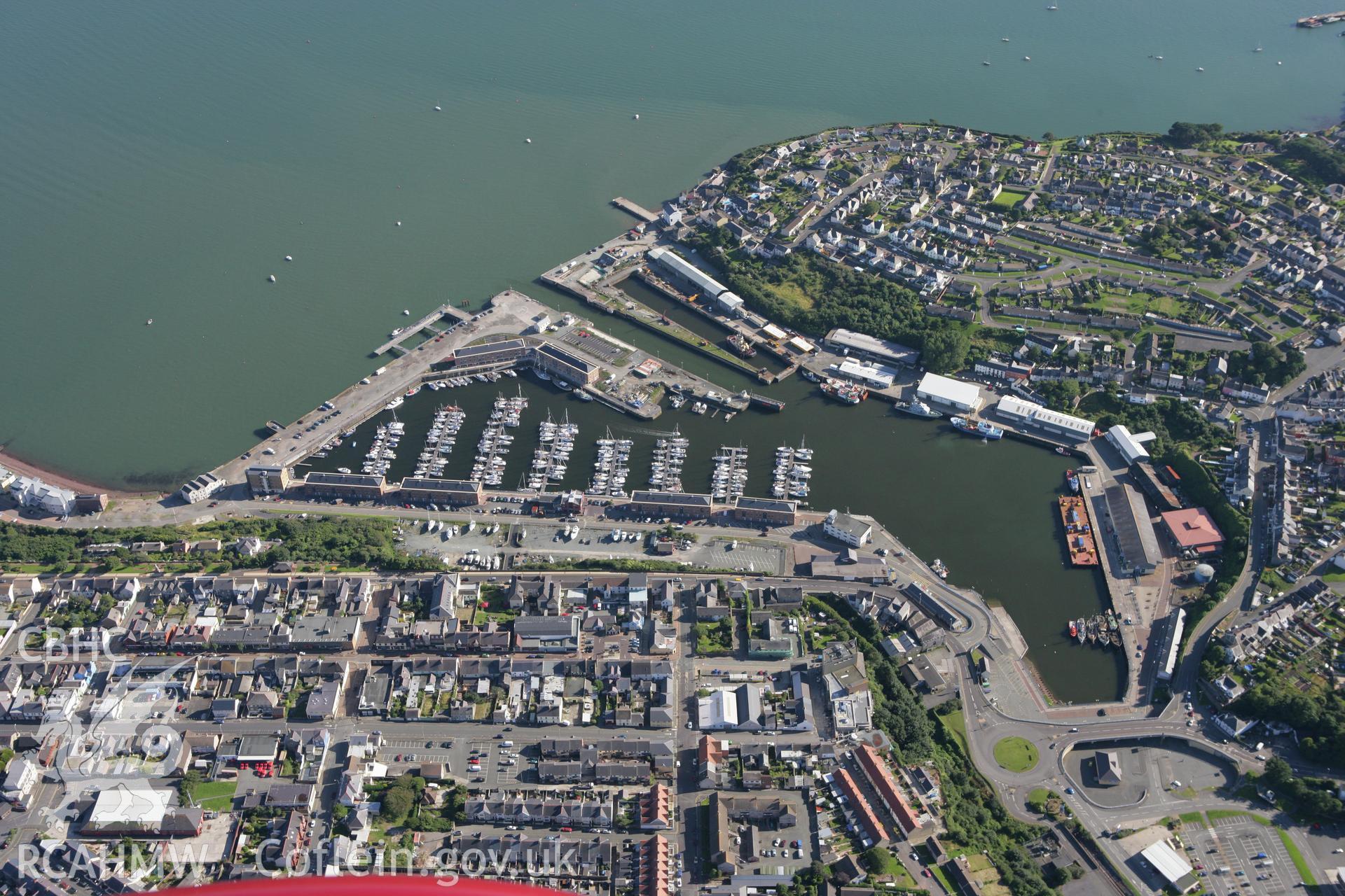 RCAHMW colour oblique aerial photograph of Milford Haven Dockyard. Taken on 30 July 2007 by Toby Driver