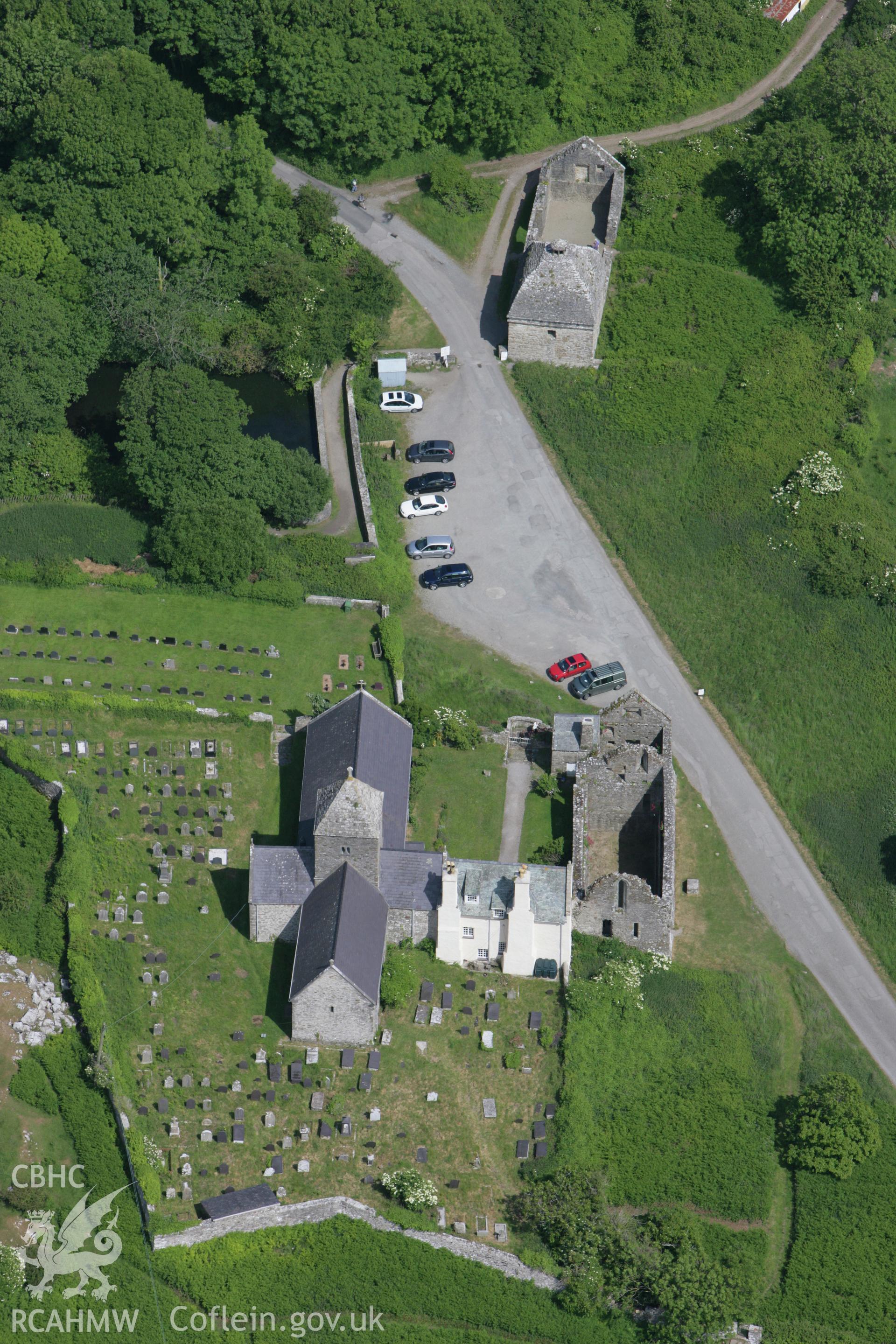 RCAHMW colour oblique photograph of Penmon Priory and Dovecote. Taken by Toby Driver on 13/06/2008.