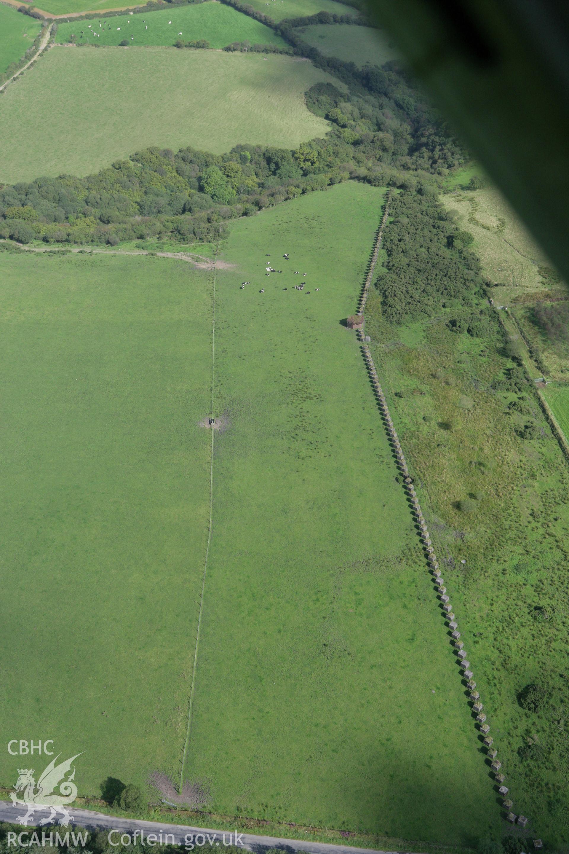 RCAHMW colour oblique photograph of Rhos-Llangeler stop line, anti tank ditch. Taken by Toby Driver on 11/09/2007.