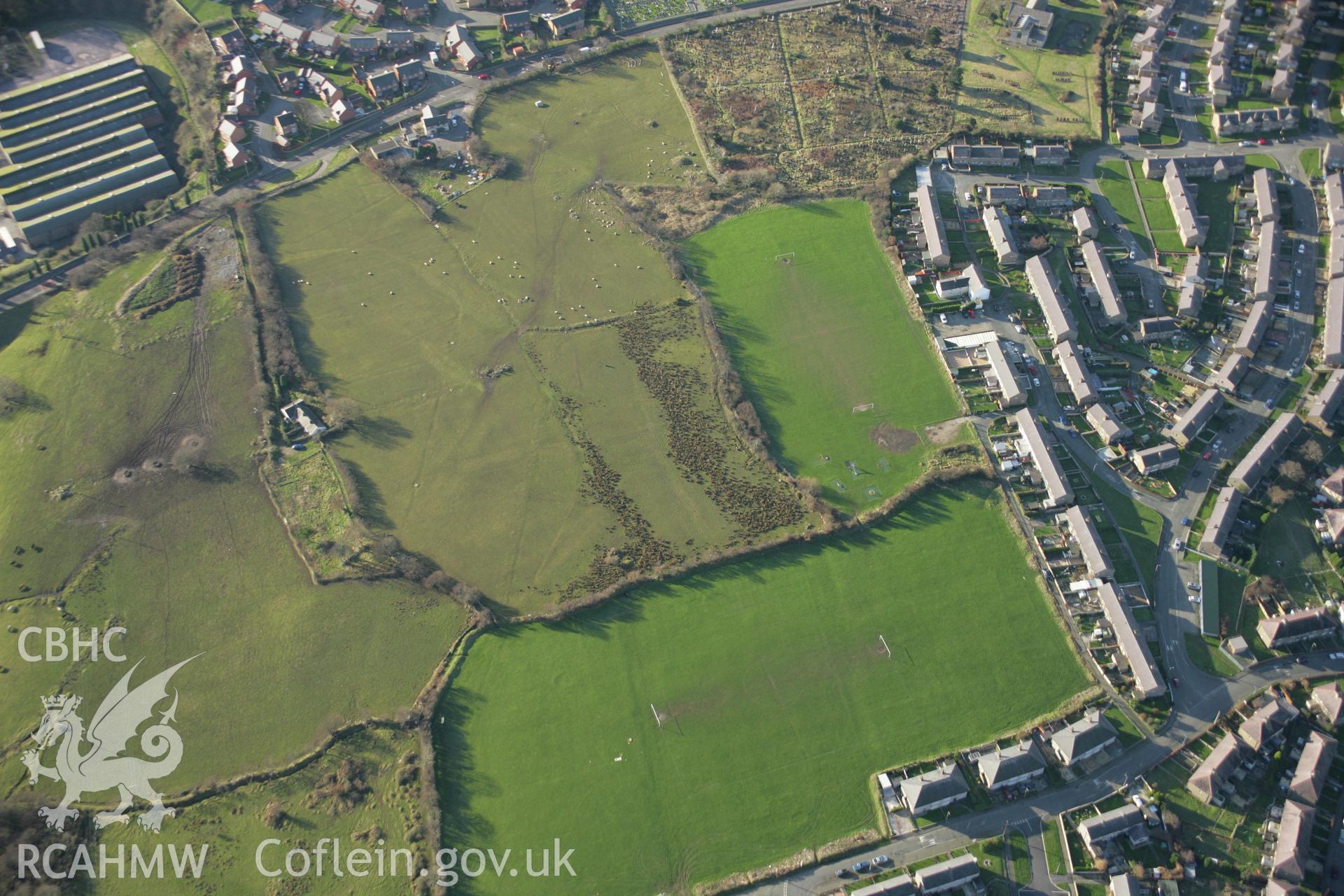 RCAHMW colour oblique aerial photograph of the Tyddyn Pandy Square Barrow Cemetery. Taken on 25 January 2007 by Toby Driver