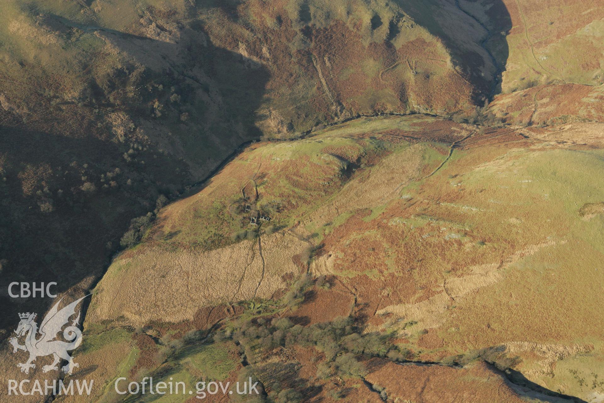 RCAHMW colour oblique photograph of Dinas Foelfraeth, farmstead. Taken by Toby Driver on 20/12/2007.