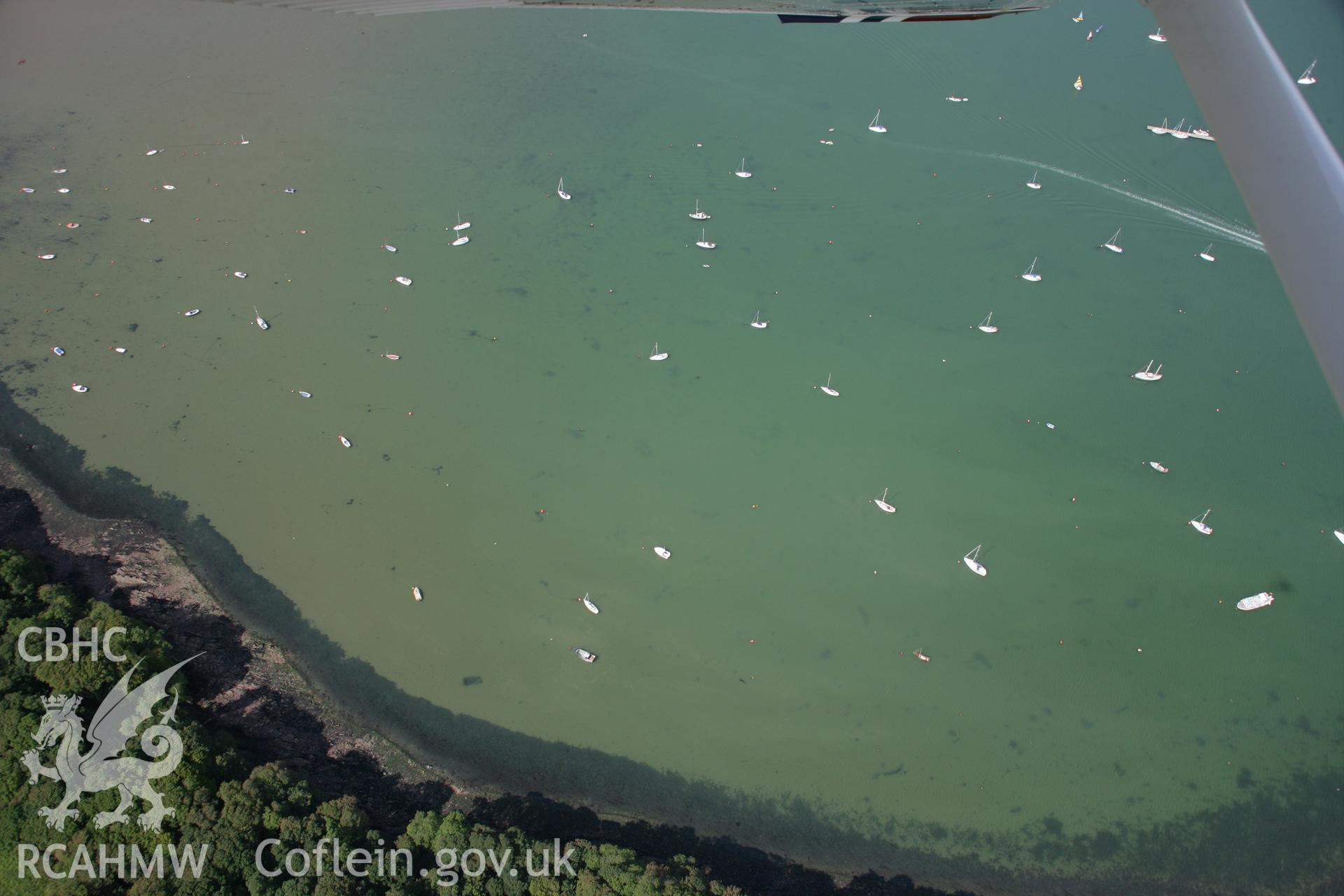 RCAHMW colour oblique photograph of Dale, boats in bay. Taken by Toby Driver on 01/08/2007.