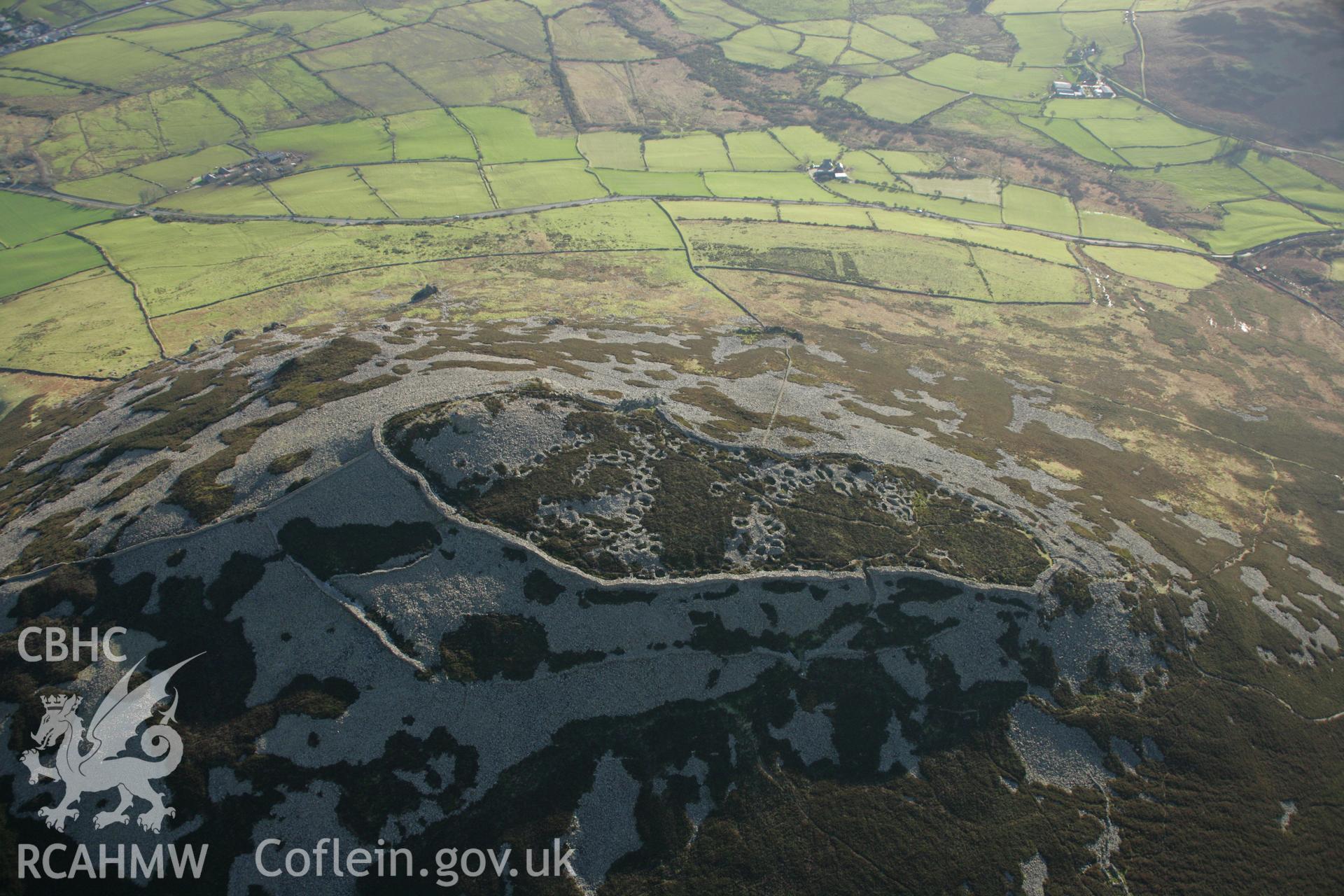 RCAHMW colour oblique aerial photograph of Tre'r Ceiri Fort, Llanaelhaearn. Taken on 25 January 2007 by Toby Driver