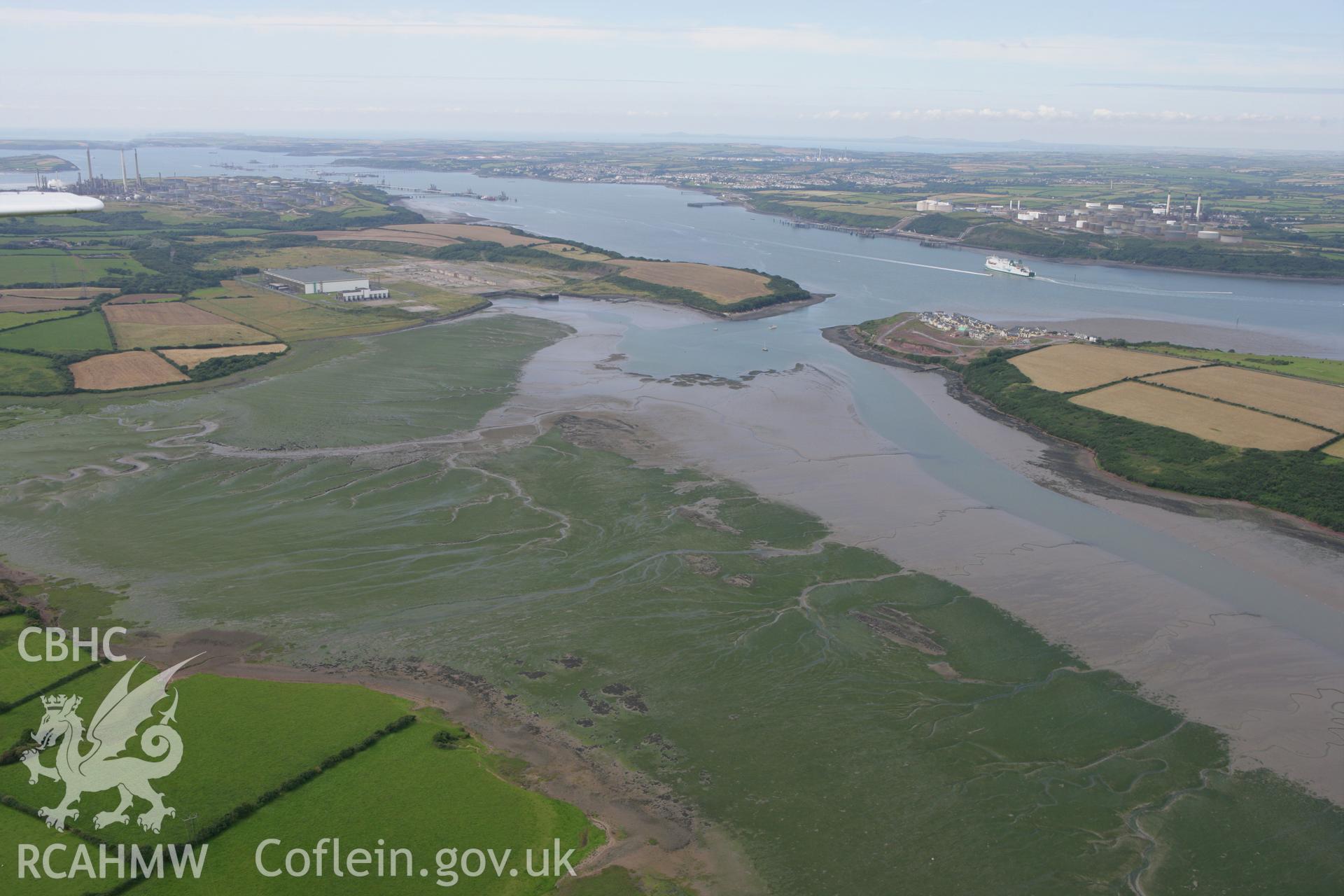 RCAHMW colour oblique photograph of Pembroke River inlet, landscape at low tide. Taken by Toby Driver on 01/08/2007.