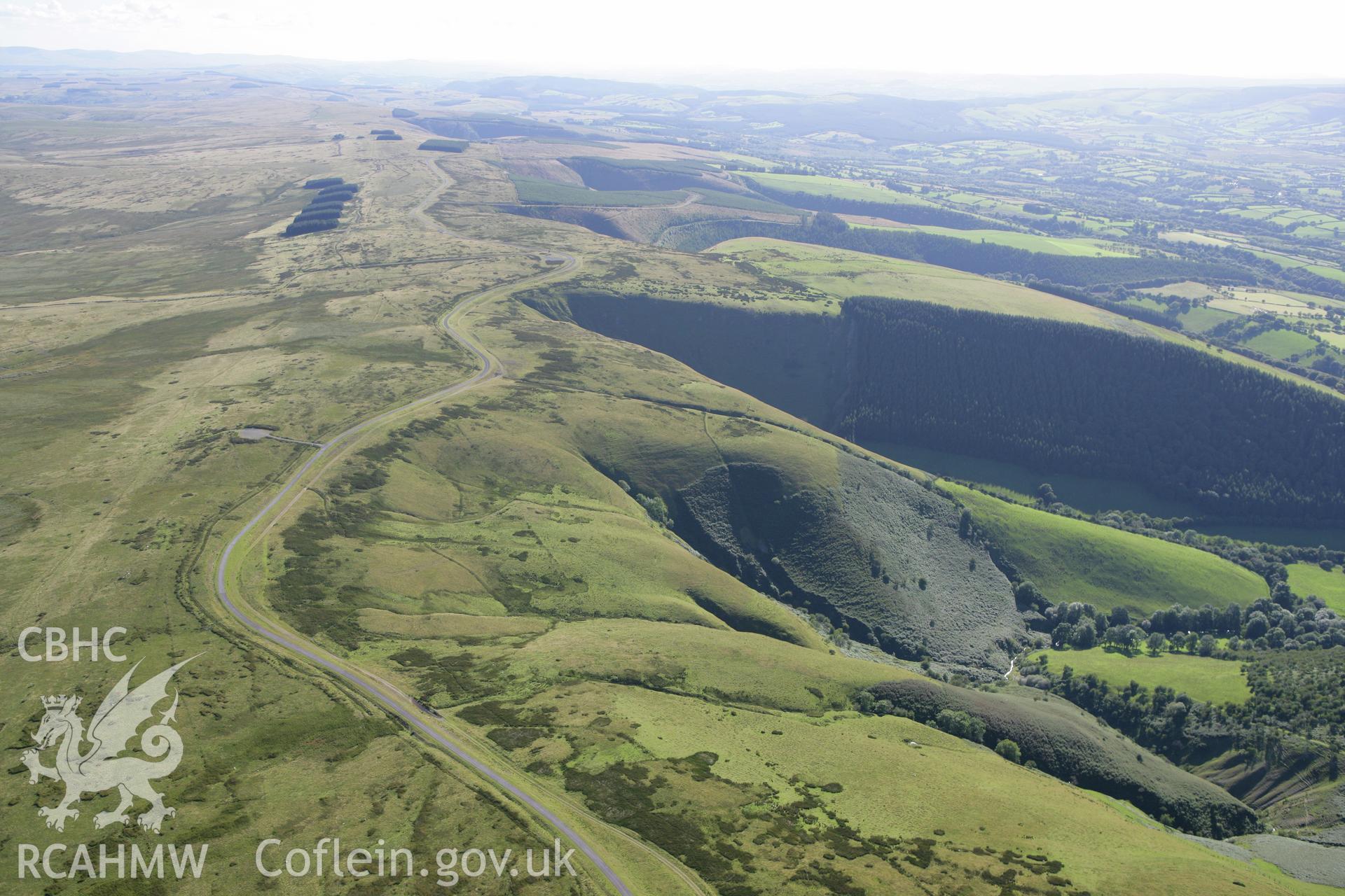 RCAHMW colour oblique aerial photograph of Sennybridge Military Training Area, Mynydd Epynt, showing the northern escarpment from the north-east. Taken on 08 August 2007 by Toby Driver