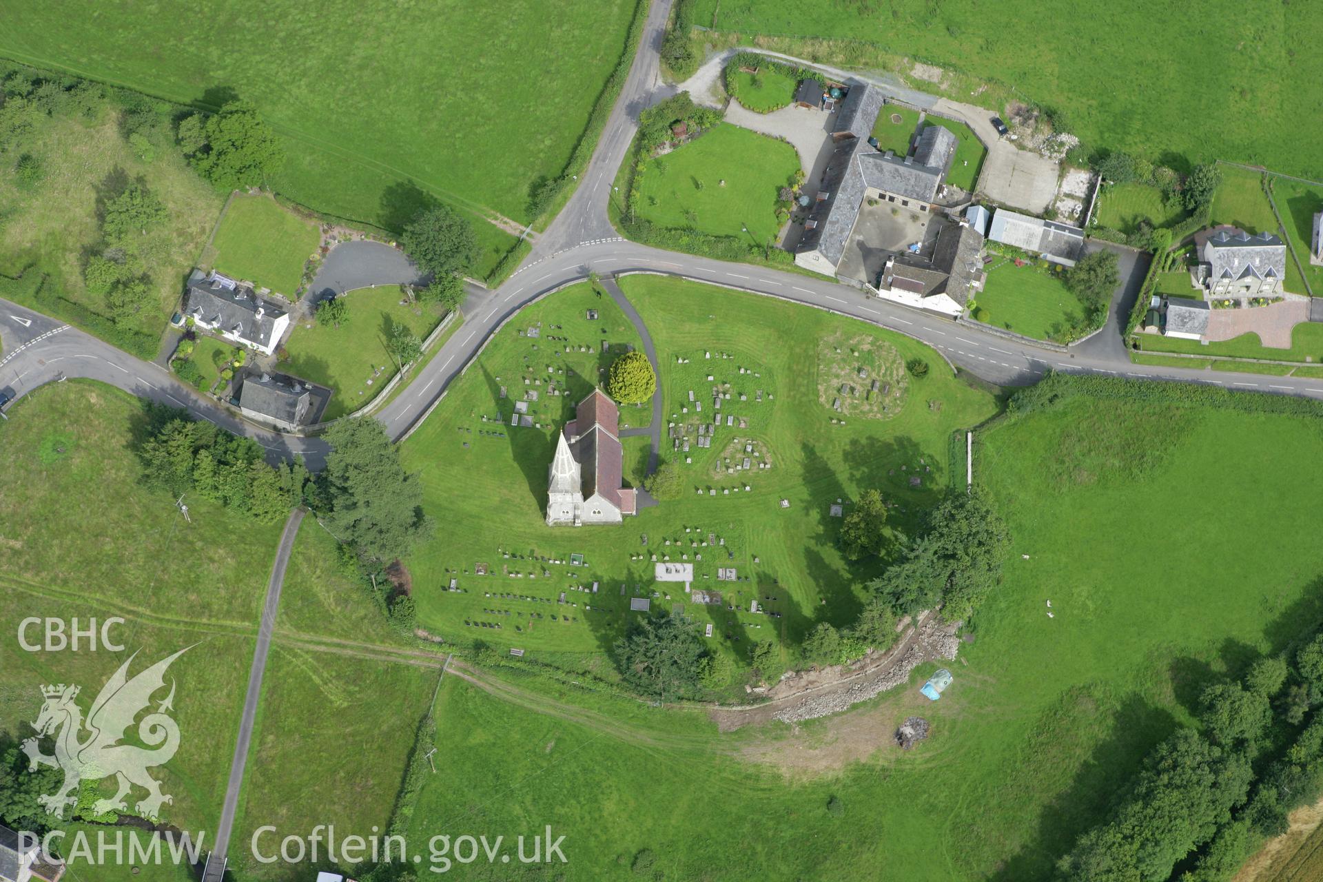 RCAHMW colour oblique aerial photograph of St. Cynog's Church, Boughrood. Taken on 09 July 2007 by Toby Driver
