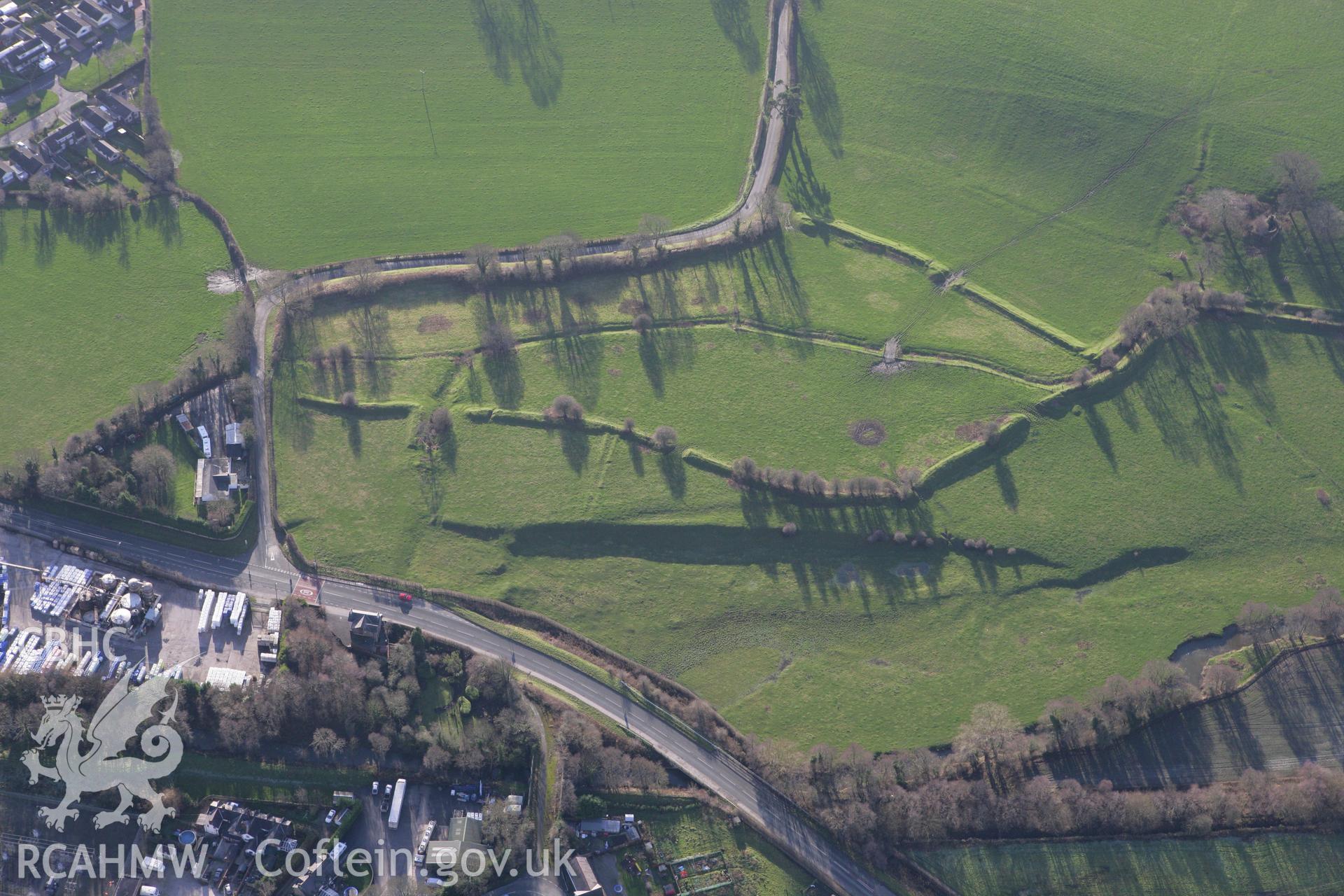 RCAHMW colour oblique photograph of Alyn Tinplate works;Earthworks of Tinplate factory pond, NW of factory. Taken by Toby Driver on 11/12/2007.