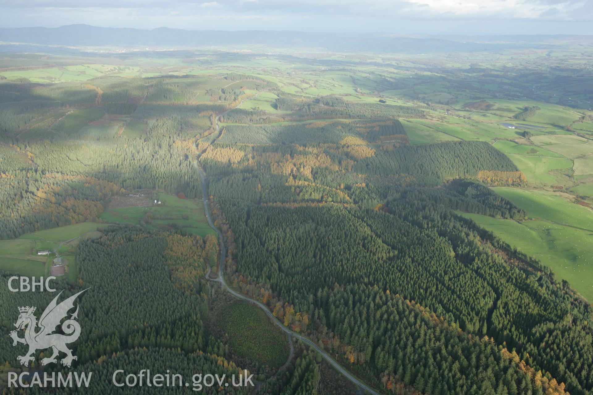 RCAHMW colour oblique photograph of Clocaenog Forest, view north-east over Bod-Petrayl. Taken by Toby Driver on 30/10/2007.