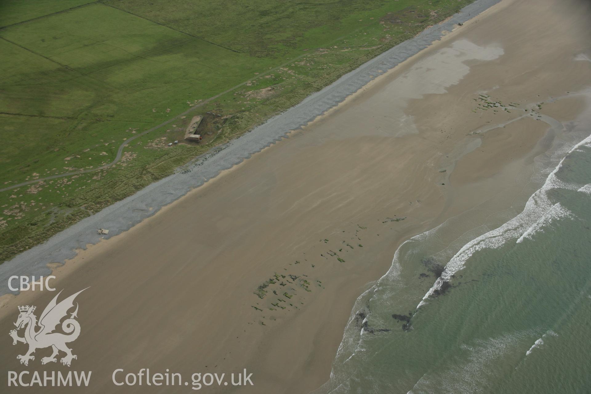 RCAHMW colour oblique photograph of Towyn, peat exposures and cuttings;Tywyn Peat Exposures. Taken by Toby Driver on 08/10/2007.