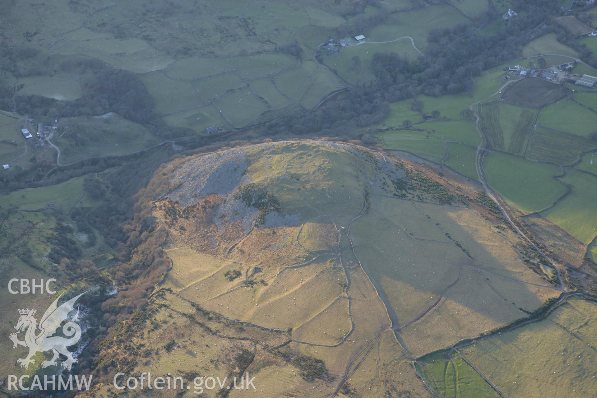 RCAHMW colour oblique photograph of Dinas hillfort. Taken by Toby Driver on 20/12/2007.