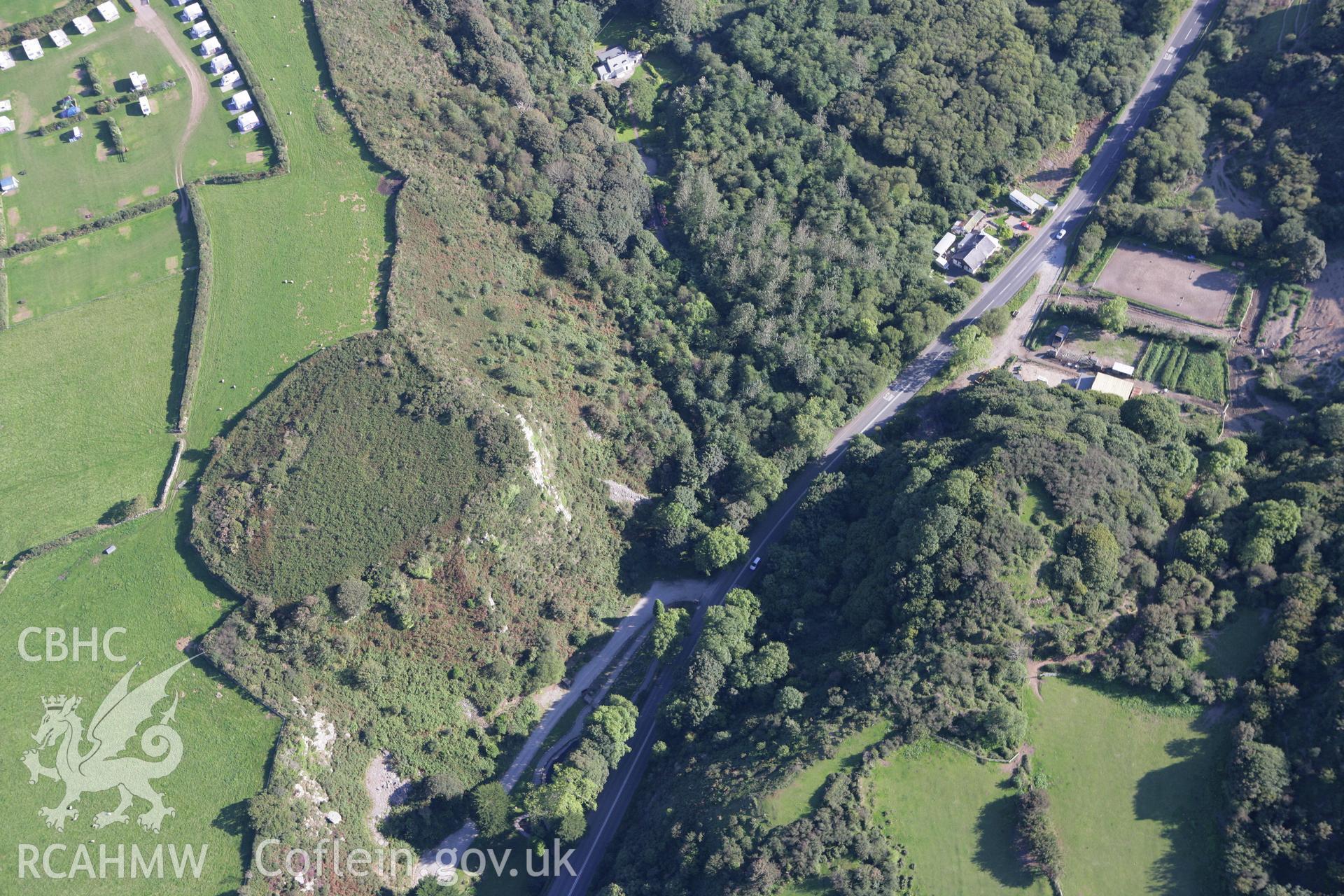 RCAHMW colour oblique aerial photograph of Pen-y-Gaer and Nant Castel Enclosures. Taken on 06 September 2007 by Toby Driver