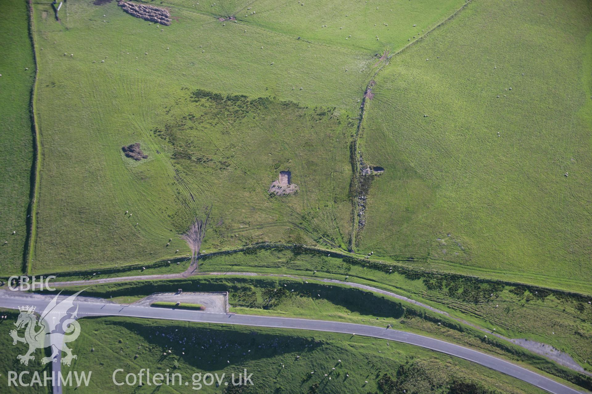 RCAHMW colour oblique aerial photograph of Blaen Clydach Fach Cairns I and II. Taken on 08 August 2007 by Toby Driver