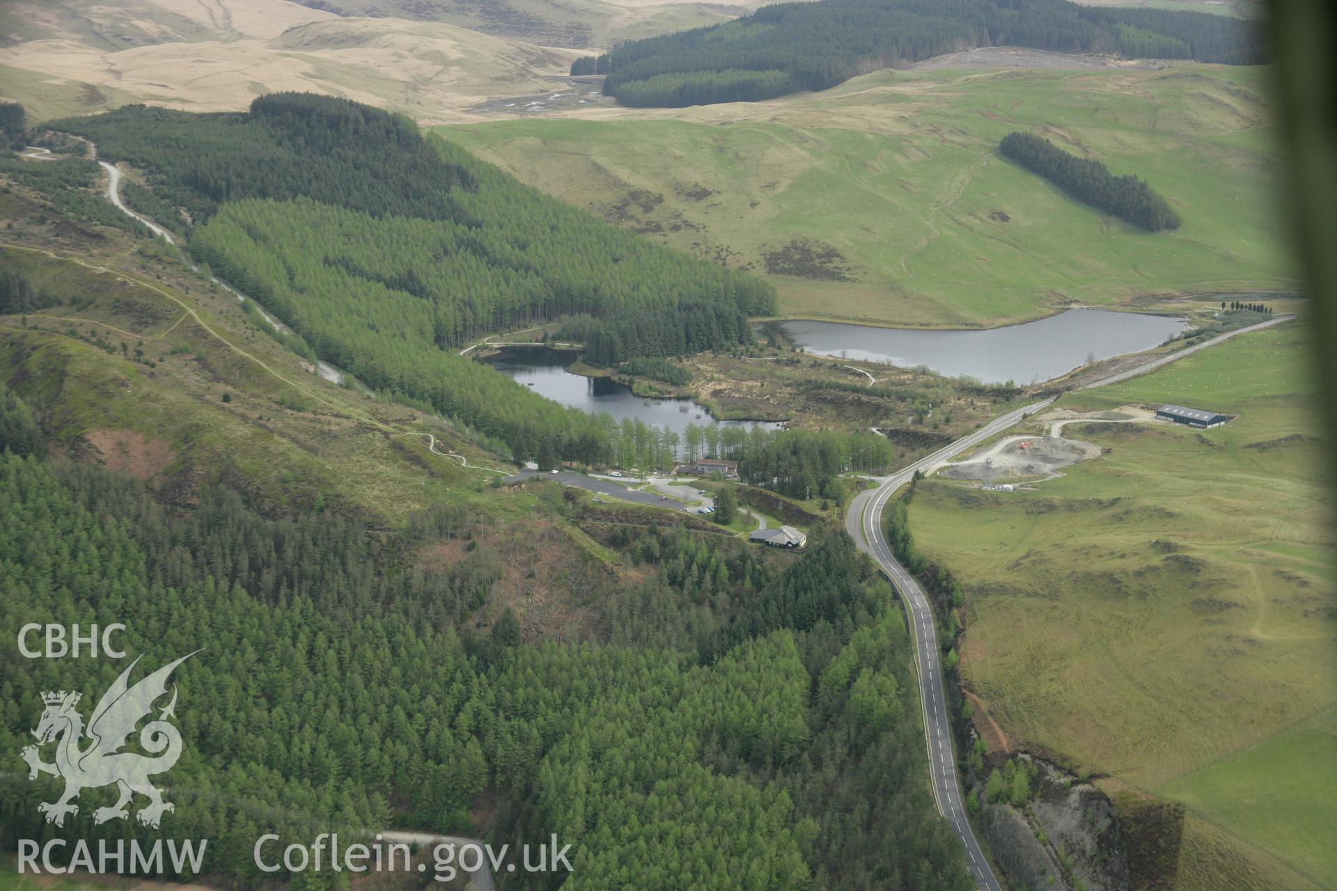RCAHMW colour oblique aerial photograph of Bwlch Nant-yr-Arian Forest Visitor Centre from the south-west. Taken on 17 April 2007 by Toby Driver