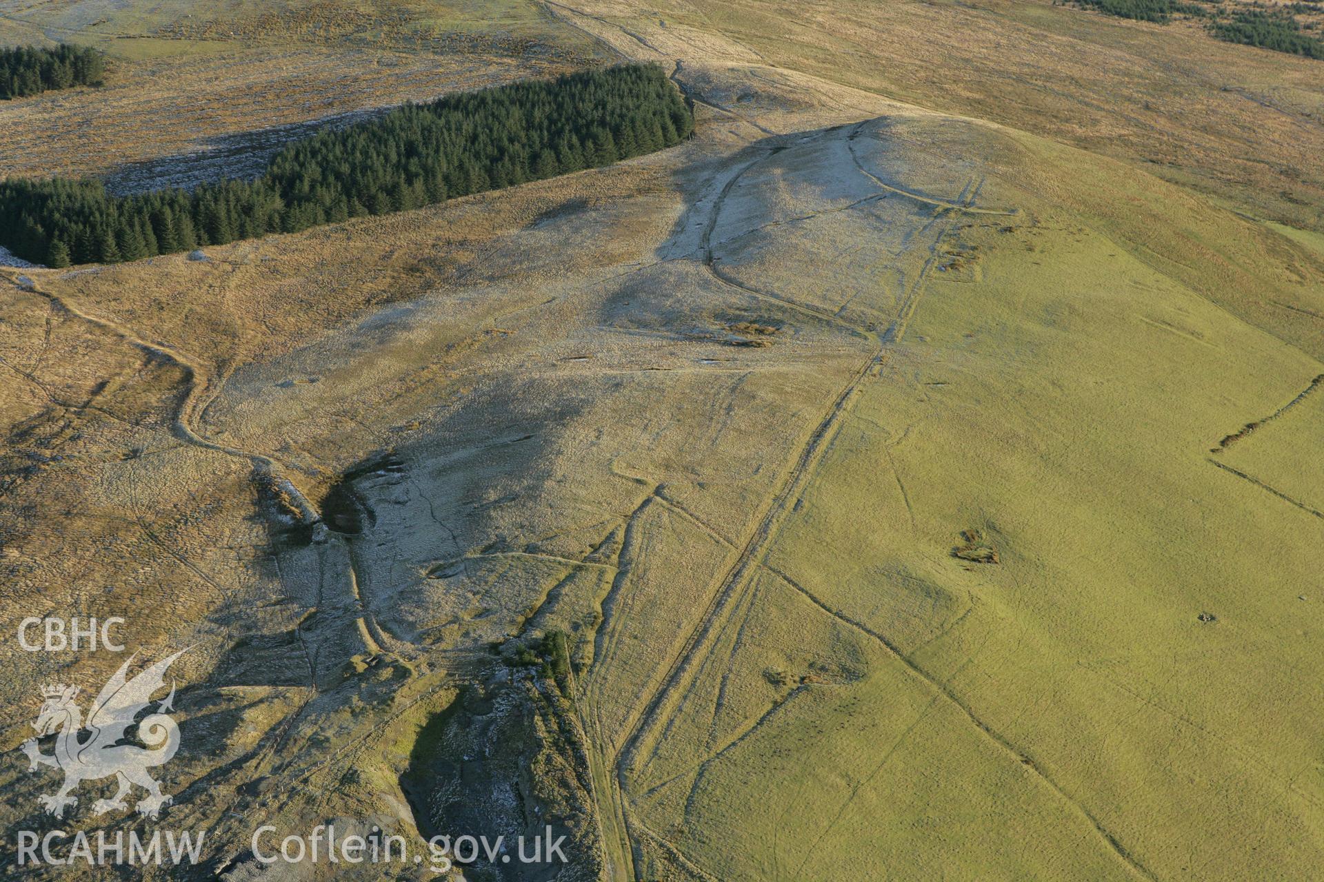 RCAHMW colour oblique photograph of the Esgairmwyn lead mine workings complex, from the west. Taken by Toby Driver on 20/12/2007.