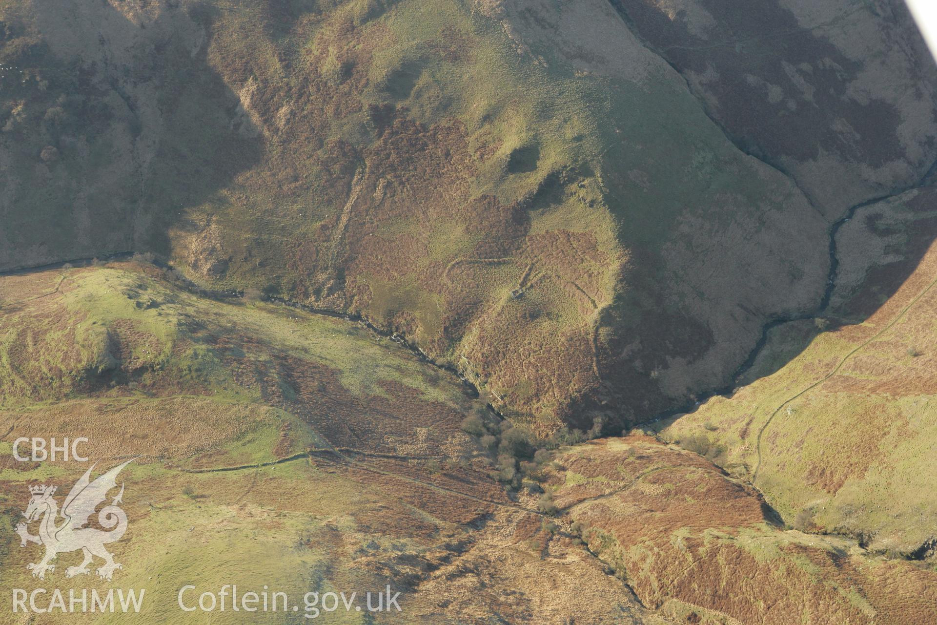 RCAHMW colour oblique photograph of Dinas Foelfraeth farmstead. Taken by Toby Driver on 20/12/2007.