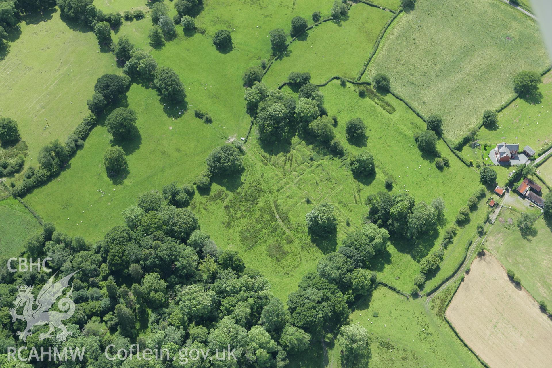 RCAHMW colour oblique aerial photograph of Castell Collen Roman Fort. Taken on 09 July 2007 by Toby Driver