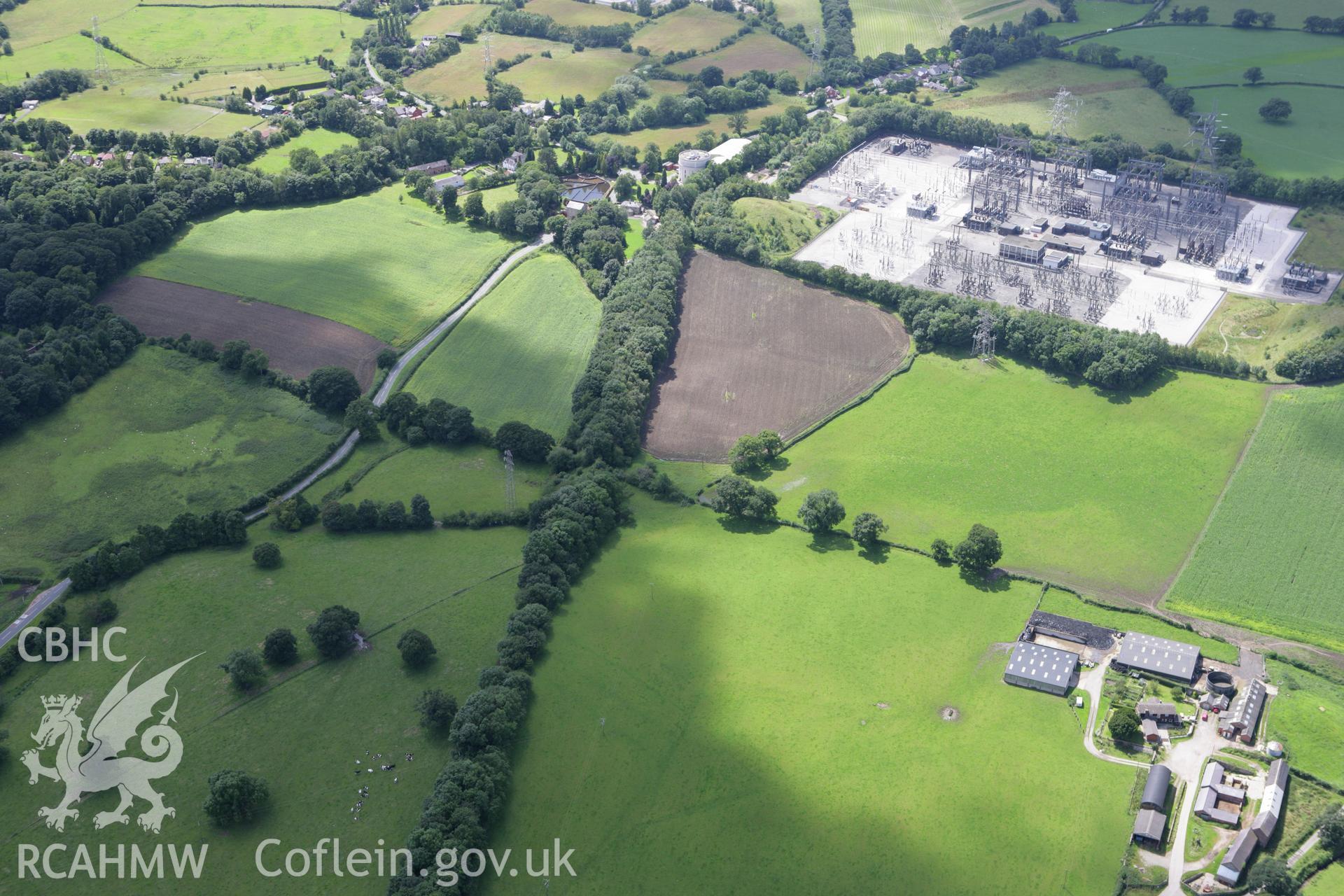 RCAHMW colour oblique aerial photograph of a section of Offa's Dyke at Cadwgwn Hall. Taken on 24 July 2007 by Toby Driver