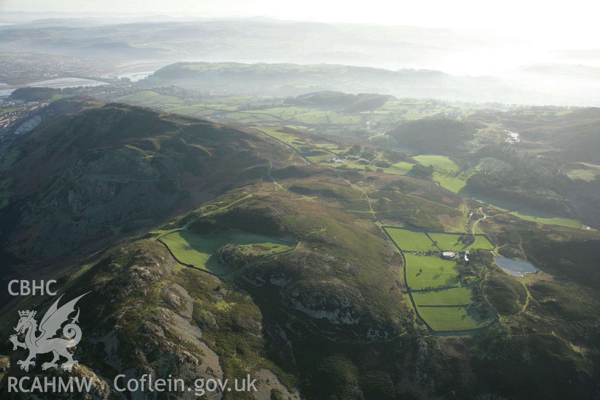 RCAHMW colour oblique aerial photograph of Castell Caer Seion, Conwy Mountain. Taken on 25 January 2007 by Toby Driver