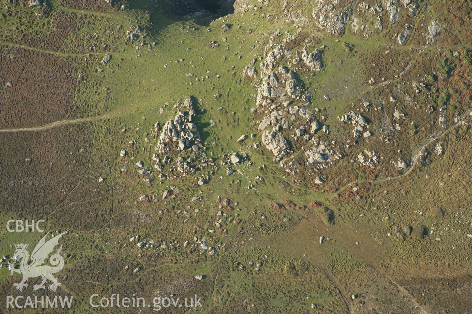 RCAHMW colour oblique photograph of Coetan Arthur burial chamber, St David's Head. Taken by Toby Driver on 23/10/2007.
