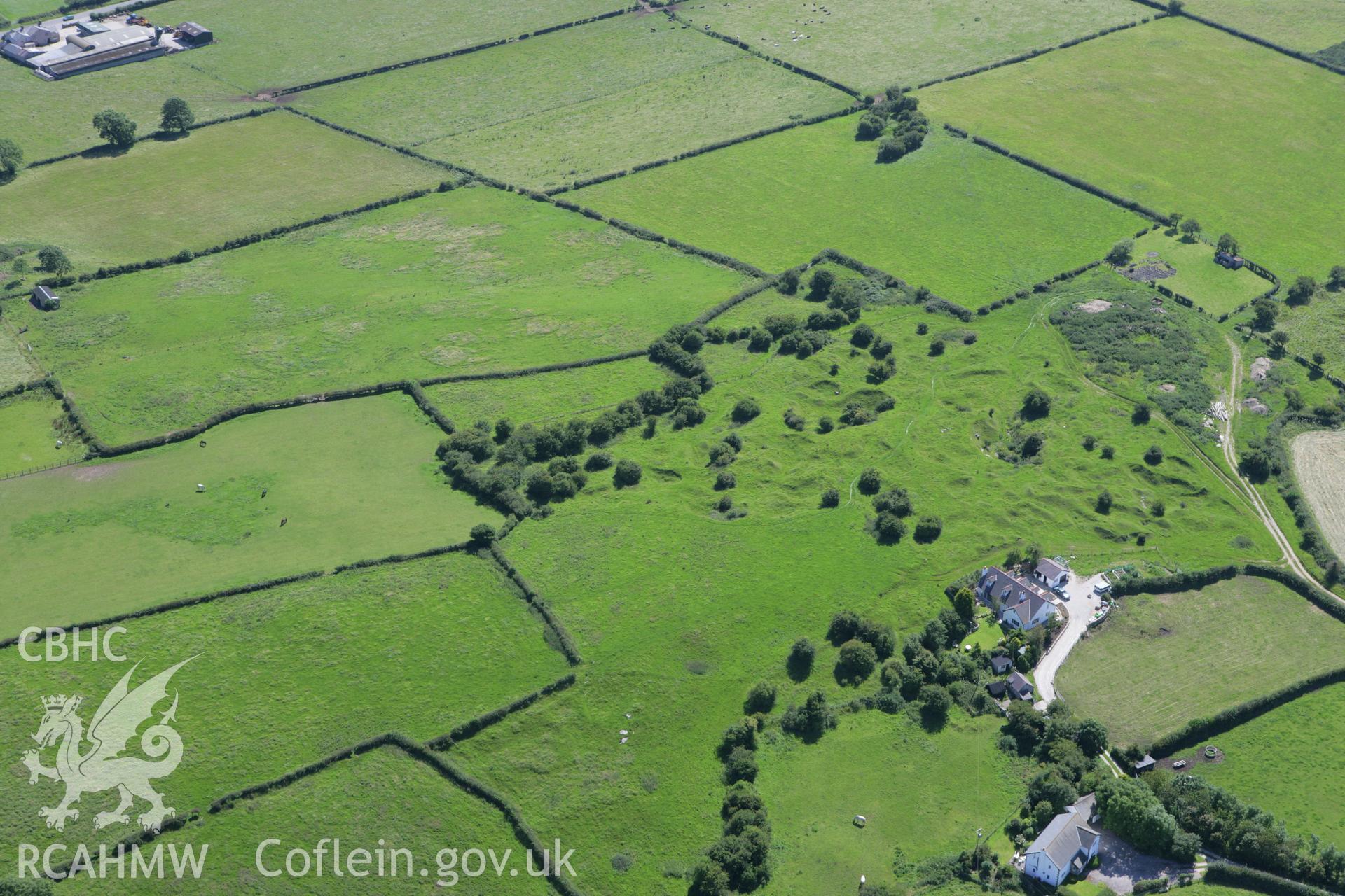 RCAHMW colour oblique aerial photograph of Axton, Tumulus V. Taken on 31 July 2007 by Toby Driver