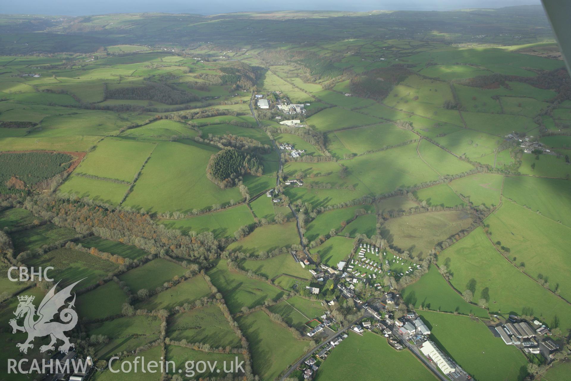 RCAHMW colour oblique photograph of Aeron Valley, landscape, with FelinFach station and FelinFach creamery, from South East. Taken by Toby Driver on 29/11/2007.