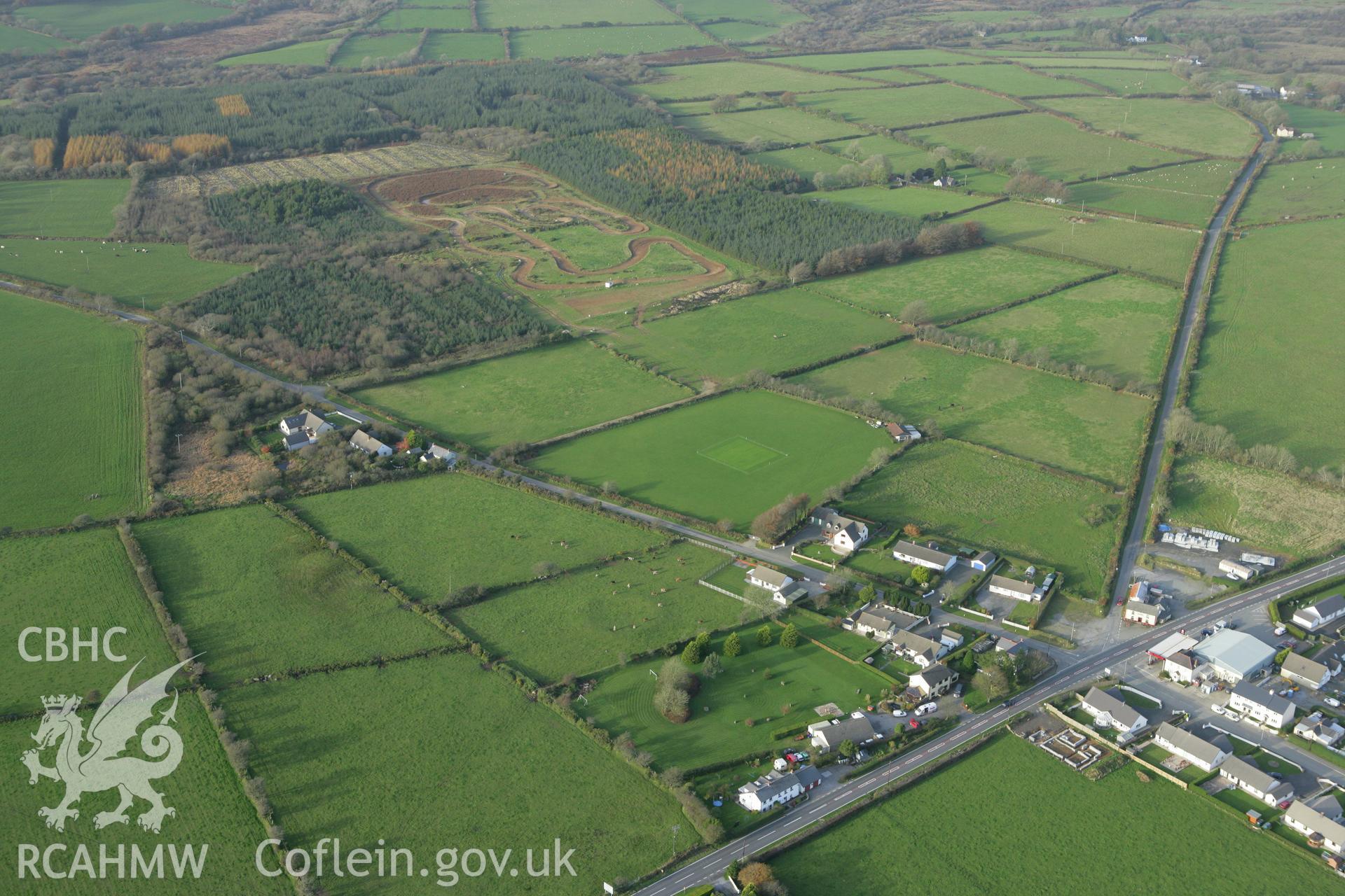 RCAHMW colour oblique photograph of Meini Gwyr, stone circle, and wide view of Glandy Cross. Taken by Toby Driver on 06/11/2007.