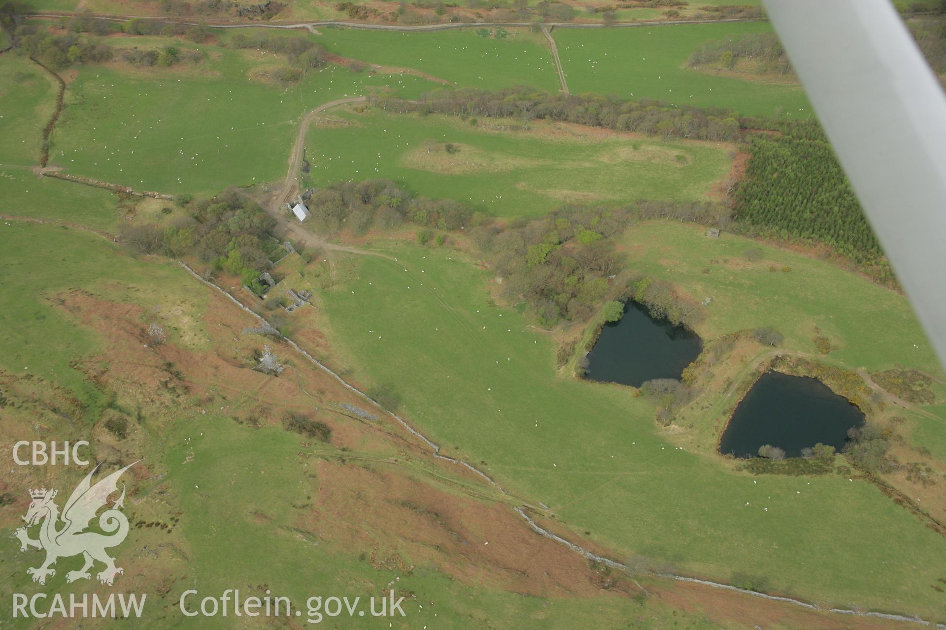 RCAHMW colour oblique aerial photograph of Bryndyfi Lead Mine. Taken on 17 April 2007 by Toby Driver