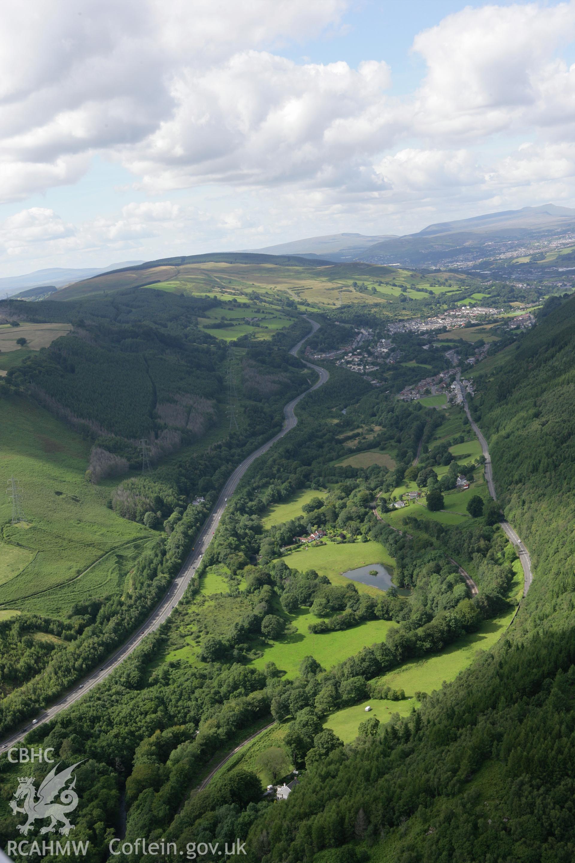 RCAHMW colour oblique aerial photograph of Pont-y-Gwaith Road Bridge over the Merthyr Tramroad, from the south. Taken on 30 July 2007 by Toby Driver