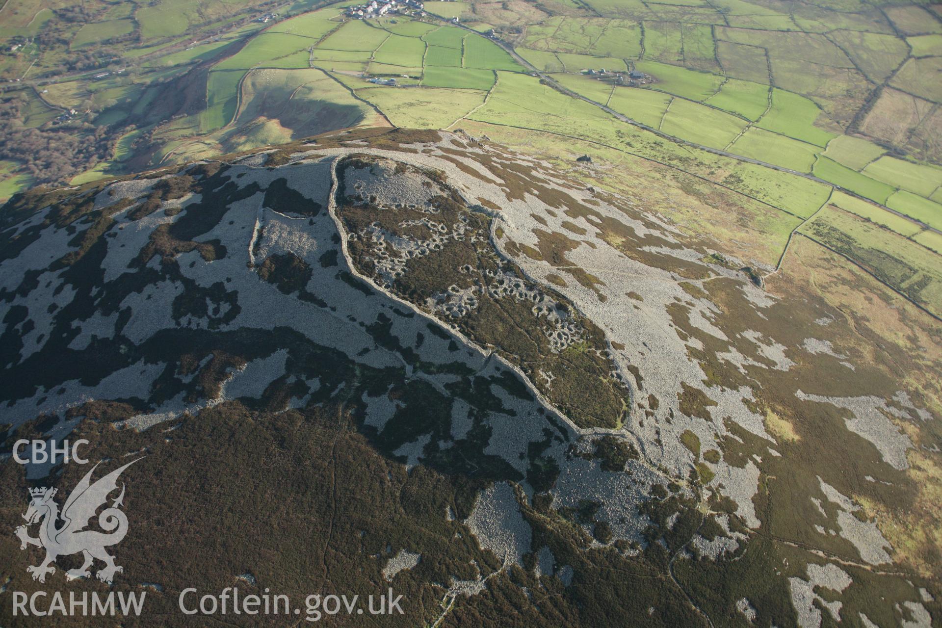 RCAHMW colour oblique aerial photograph of Tre'r Ceiri Fort, Llanaelhaearn. Taken on 25 January 2007 by Toby Driver