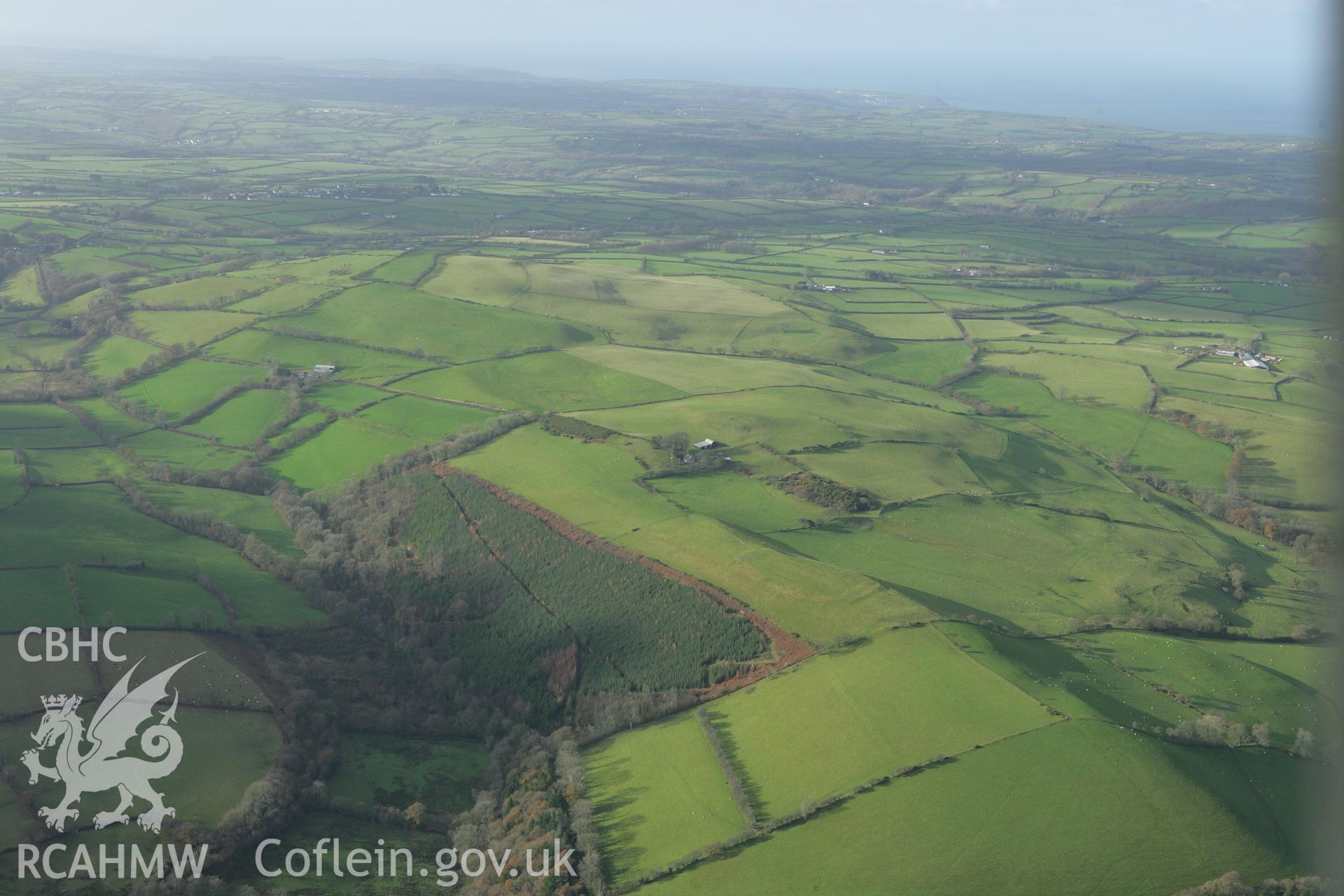 RCAHMW colour oblique photograph of Pen y Gaer hillfort, landscape view. Taken by Toby Driver on 29/11/2007.