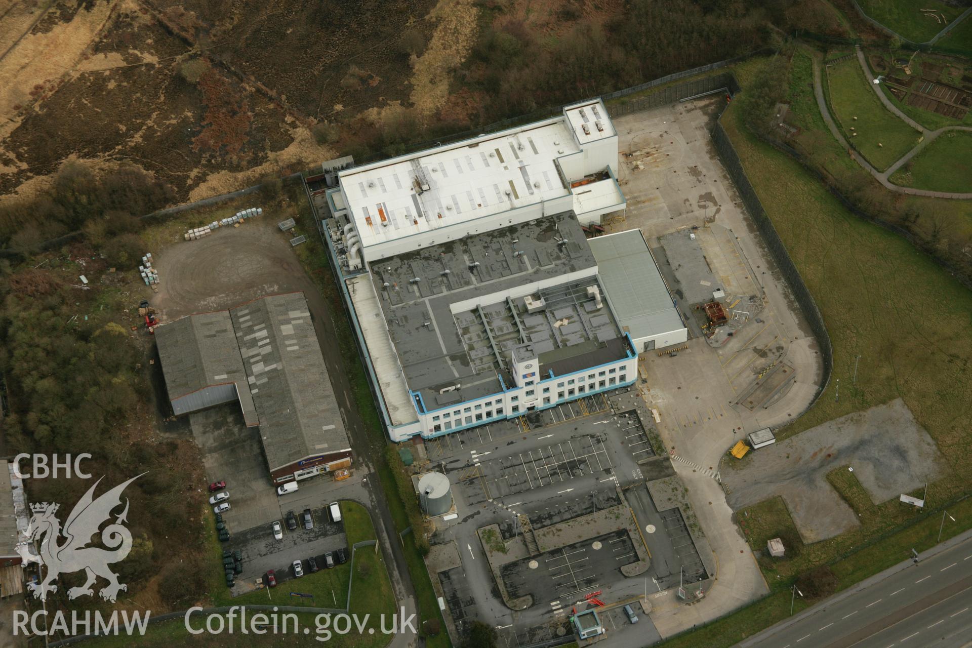 RCAHMW colour oblique aerial photograph of Walkers Snack Foods Ltd, Fforestfach. Taken on 16 March 2007 by Toby Driver