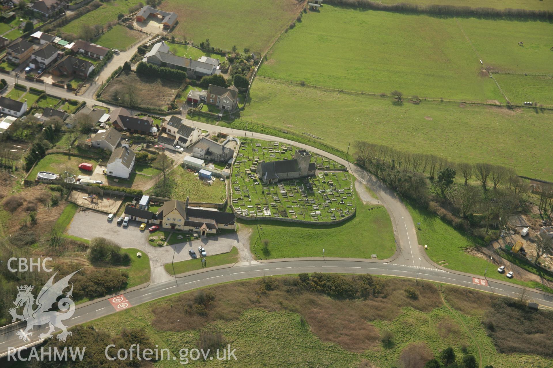 RCAHMW colour oblique aerial photograph of St Mary Magdalen's Church, Mawdlam. Taken on 16 March 2007 by Toby Driver