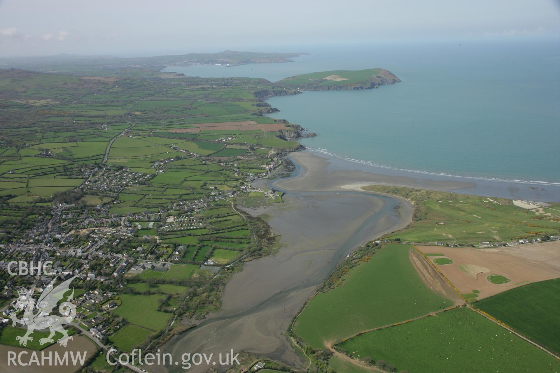 RCAHMW colour oblique aerial photograph of Newport town, Pembrokeshire, in landscape view. Taken on 17 April 2007 by Toby Driver
