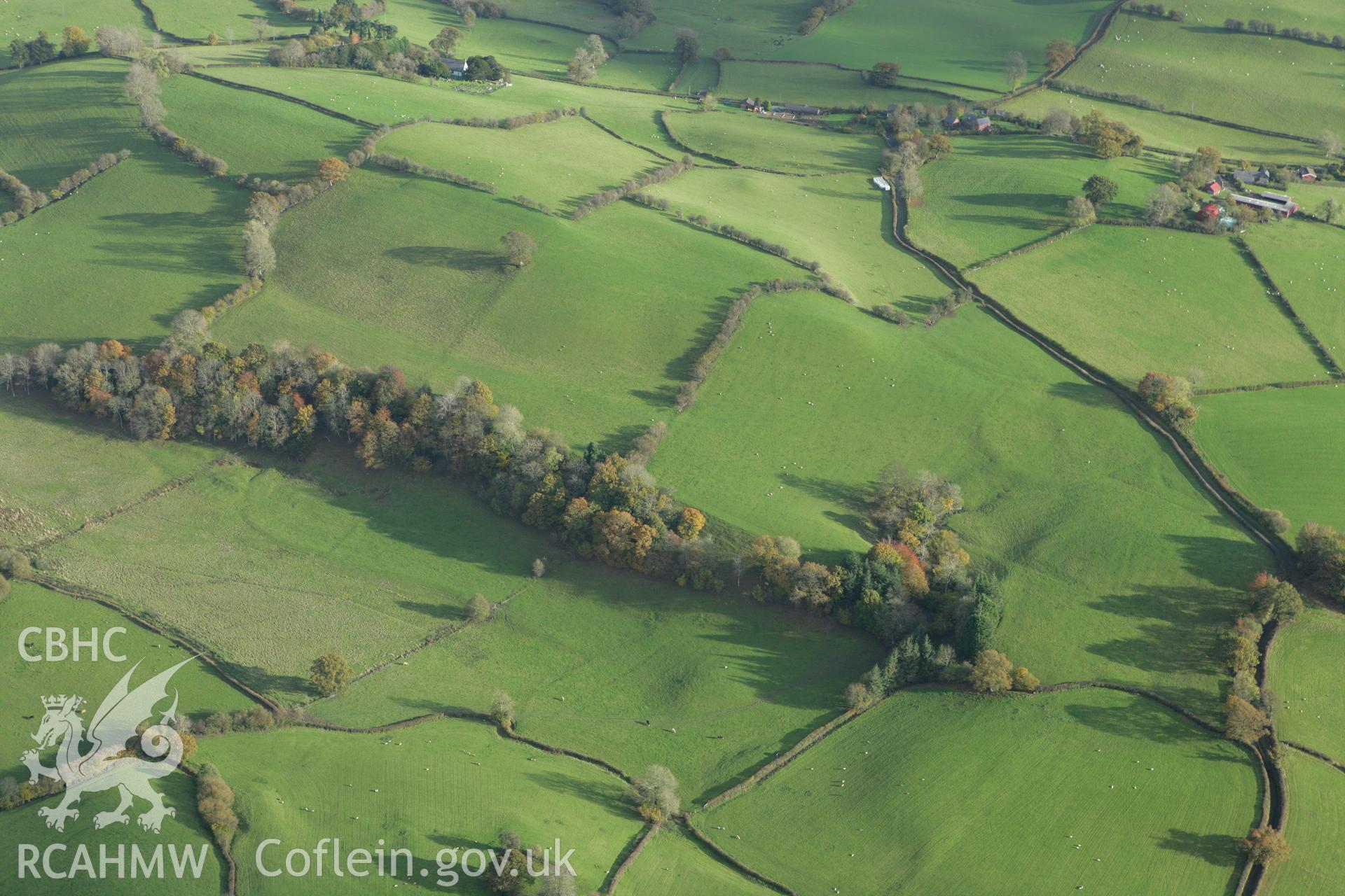 RCAHMW colour oblique photograph of Pentre Camp, hillfort. Taken by Toby Driver on 30/10/2007.