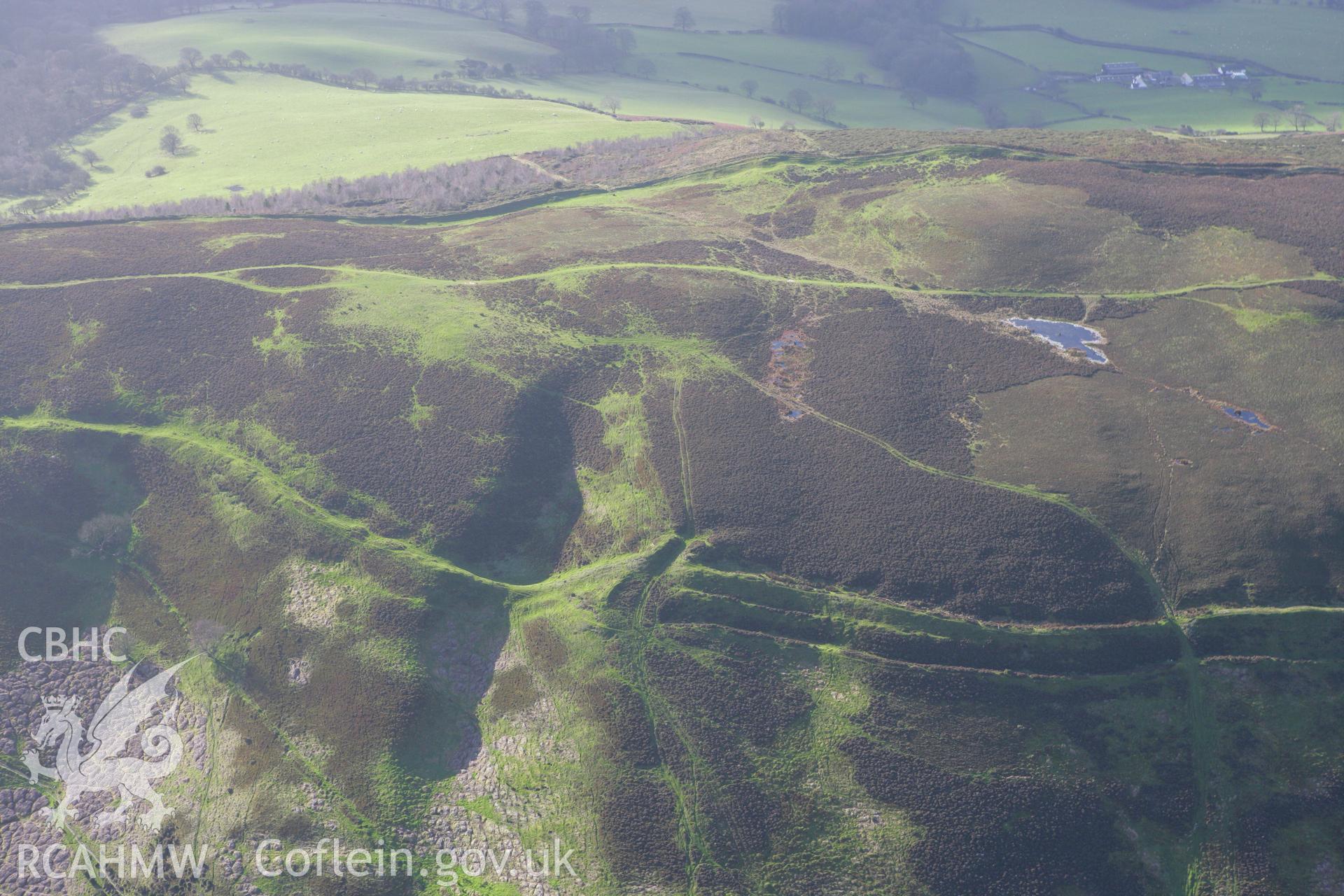 RCAHMW colour oblique photograph of Penycloddiau hillfort. Taken by Toby Driver on 11/12/2007.
