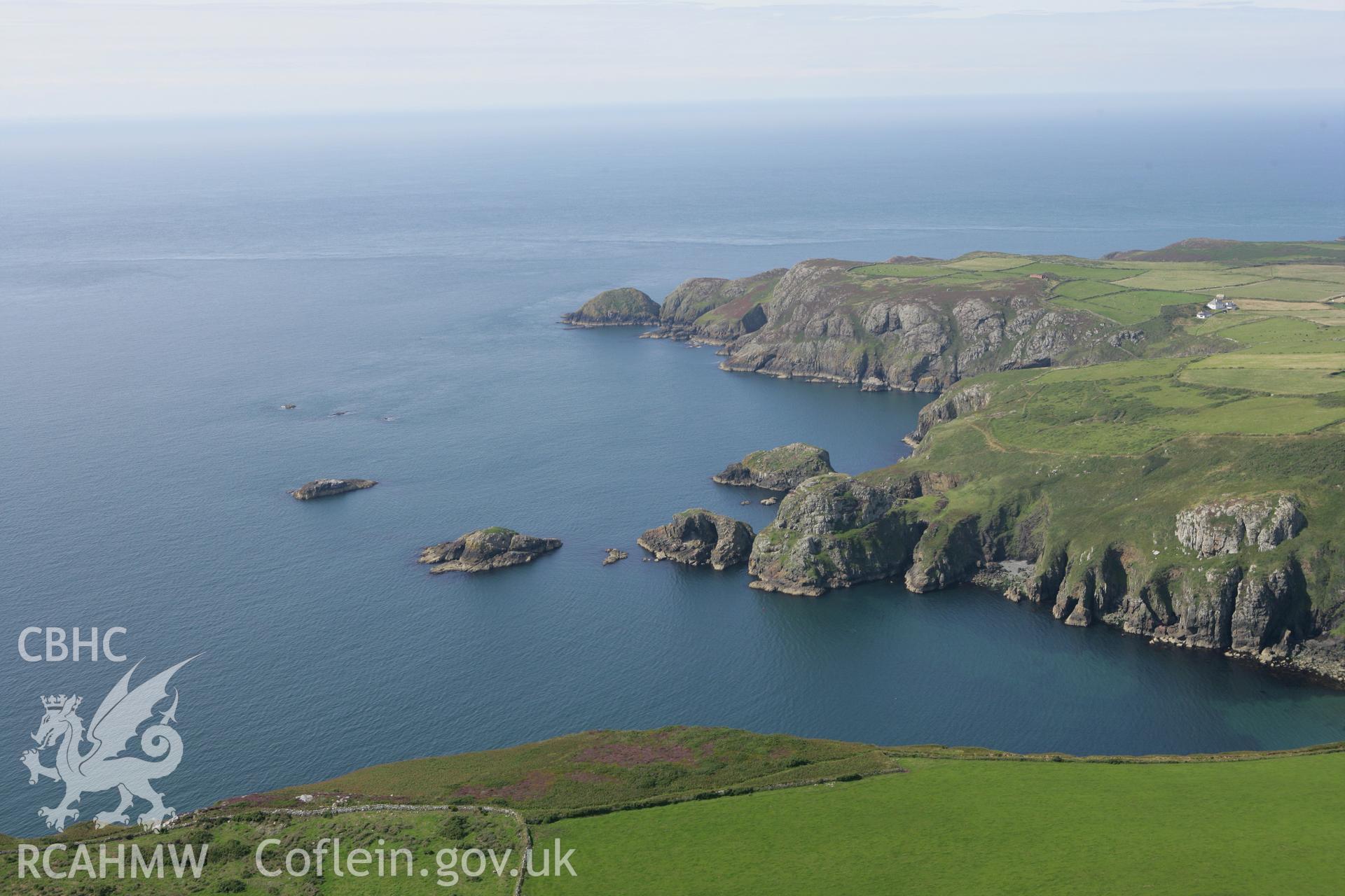 RCAHMW colour oblique photograph of Dinas Mawr promontory fort. Taken by Toby Driver on 01/08/2007.